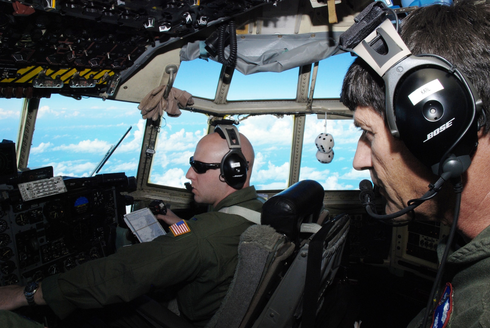 Senior Master Sgt. Dennis Karl, a C-130 Hercules flight engineer, and 1st Lt.Casey Fallon, a C-130 co-pilot, were serving on their scheduled Coronet Oak rotation with the 35th Expeditionary Airlift Squadron at Mu?iz Air National Guard Base, Puerto Rico when an alert was issued after the earthquake in Haiti. Both Airmen are Guardsmen with the 179th Airlift Wing at Mansfield, Ohio. Their Jan. 22, 2010 flight was their sixth mission in support of Operation Unified Response.