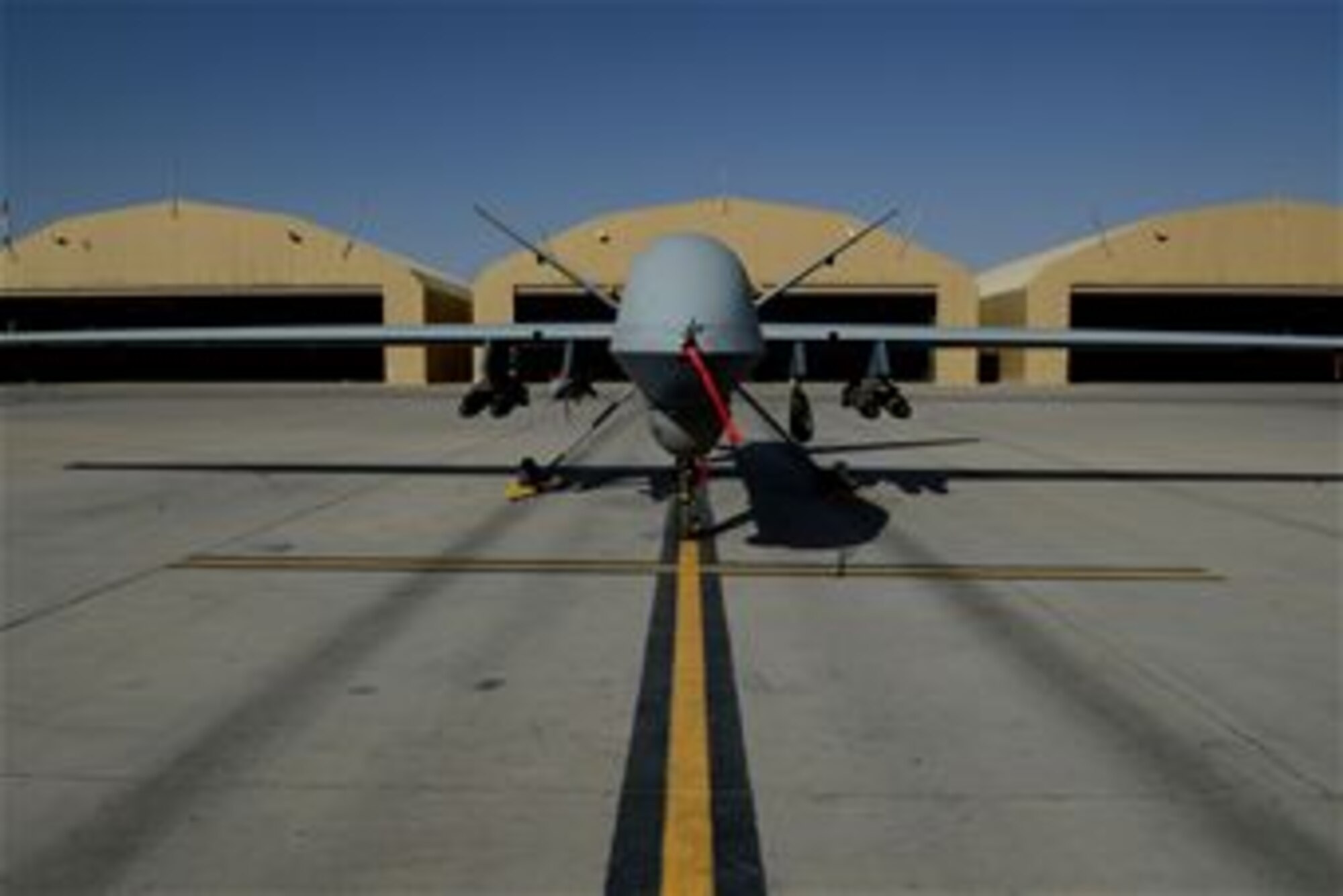 An MQ-9 Reaper with the 62nd Expeditionary Reconnaissance Squadron sits on a ramp Aug. 18, 2014, at Kandahar Airfield, Afghanistan. The Reaper is launched, recovered and maintained here. It is remotely piloted by pilots in bases located in the U.S. (U.S. Air Force photo/Staff Sgt. Evelyn Chavez)