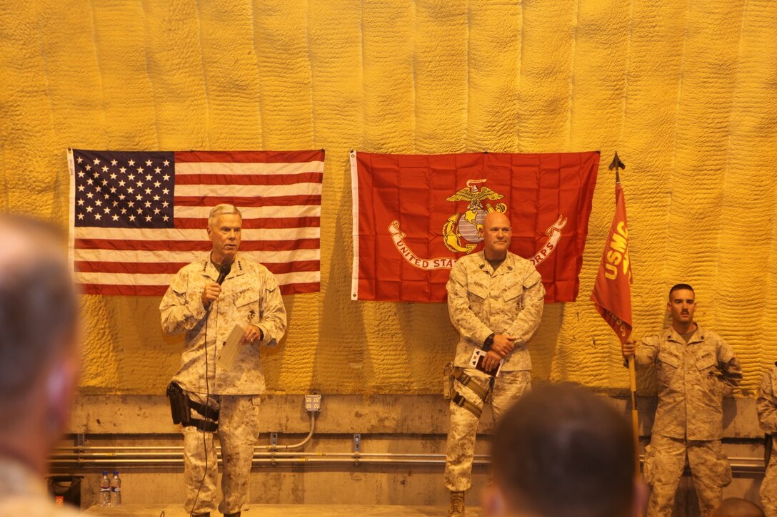 General James F. Amos, left, the 35th Commandant of the Marine Corps, and Sgt. Maj. Micheal Barrett, the 17th Sergeant Major of the Marine Corps, speak to Marines and sailors of Redeployment and Retrograde in support of Reset and Reconstitution Operations Group aboard Camp Leatherneck, Afghanistan, Sept. 6, 2014. Gen. Amos and Sgt. Maj. Barrett visited Marines and sailors serving with Marine Expeditionary Brigade – Afghanistan in Helmand province for the final time, thanking them for their service and sacrifice.