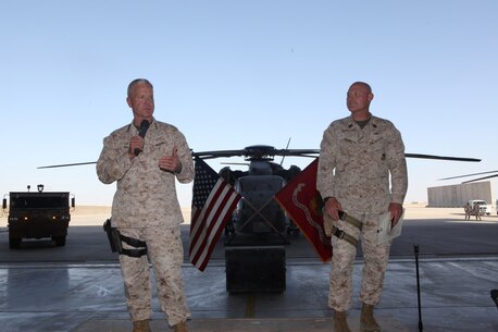 General James F. Amos, left, the 35th Commandant of the Marine Corps, and Sgt. Maj. Micheal Barrett, the 17th Sergeant Major of the Marine Corps, speak to Marines and sailors of Marine Aircraft Group - Afghanistan aboard Camp Bastion, Afghanistan, Sept. 6, 2014. Gen. Amos and Sgt. Maj. Barrett visited Marines and sailors serving with Marine Expeditionary Brigade – Afghanistan in Helmand province for the final time, thanking them for their service and sacrifice.
