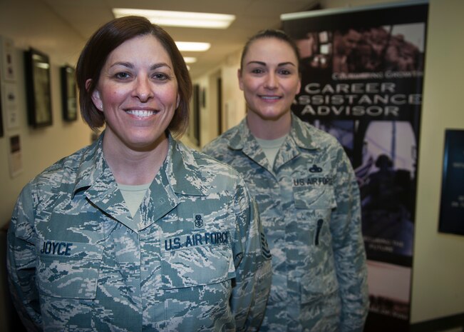 Senior Master Sgt. Tonya Joyce (left) and Master Sgt. Marcy Holland, both 99th Force Support Squadron career assistance advisors, are available to help Airmen stationed in Southern Nevada and geographically separated units throughout the region with information about retraining and transitioning out of military service. Although the CAAs can work with Airmen one-on-one, they disseminate information through various seminars and classes they conduct, which includes the Informed Decision Seminar, Retraining 101, NCO and Senior NCO Professional Enhancement Seminars. (U.S. Air Force photo by Staff Sgt. Siuta B. Ika)