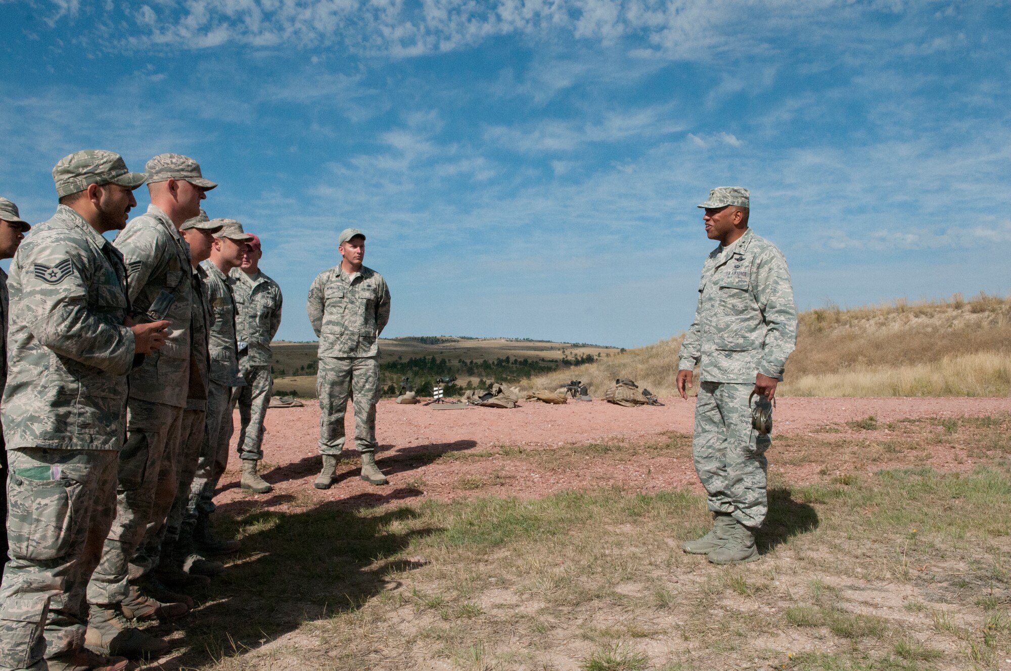 Maj. Gen. Richard Clark, Air Force Global Strike Command vice commander, addresses a class of nuclear advanced designated marksman student trainees of the 620th Ground Combat Training Squadron at Camp Guernsey, Wyo., Sept.  4, 2014. Clark visited the camp to become familiarized with the training capabilities offered at Camp Guernsey. (U.S. Air Force photo by Lan Kim)