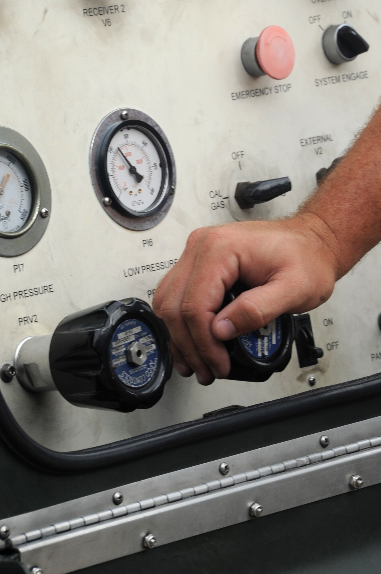 A maintainer assigned to 927 AMXS services the KC-135 Stratotanker gas oxygen system (GOX) Sept. 7 at MacDill AFB. The GOX provides oxygen to members aboard the aircraft in the event of an emergency. (U.S. Air Force Photo / SSgt Adam C. Borgman)