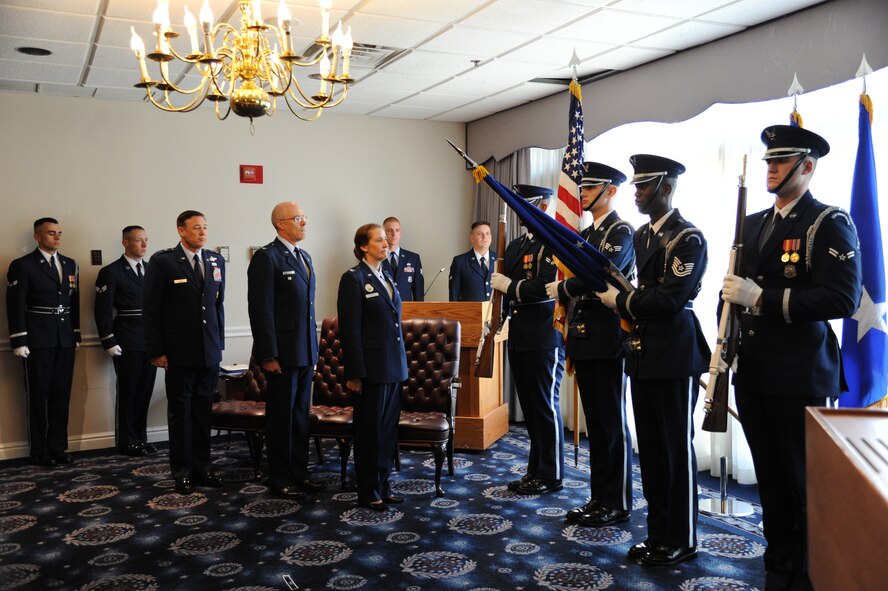 Airmen from the U.S. Air Force Honor Guard present the colors during an Air Force District of Washington bi-monthly retirement ceremony at Joint Base Anacostia-Bolling, Washington, D.C., Aug. 26, 2014. The AFDW commander or his designated representative hosts the ceremony. Active duty Air Force personnel, Air Force Reserve and Air National Guard the rank of colonel and below assigned to the National Capital Region and serviced by the Military Personnel Flight at JBAB, the Pentagon or Joint Base Andrews are eligible to participate in the ceremony. (U.S. Air Force photo/Master Sgt. Tammie Moore)