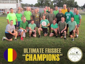 The U.S. Army Capabilities Integration Center’s Concept Development and Learning Directorate Ultimate Frisbee team took first place during a monthly physical training event at Fort Eustis, Va., Aug. 28, 2014. U.S. Army Command Sgt. Maj. Joe B. Parson, ARCIC command sergeant major, awarded the winning team a certificate of congratulations. (U.S. Air Force photo illustration by Senior Airman Aubrey White/Released)