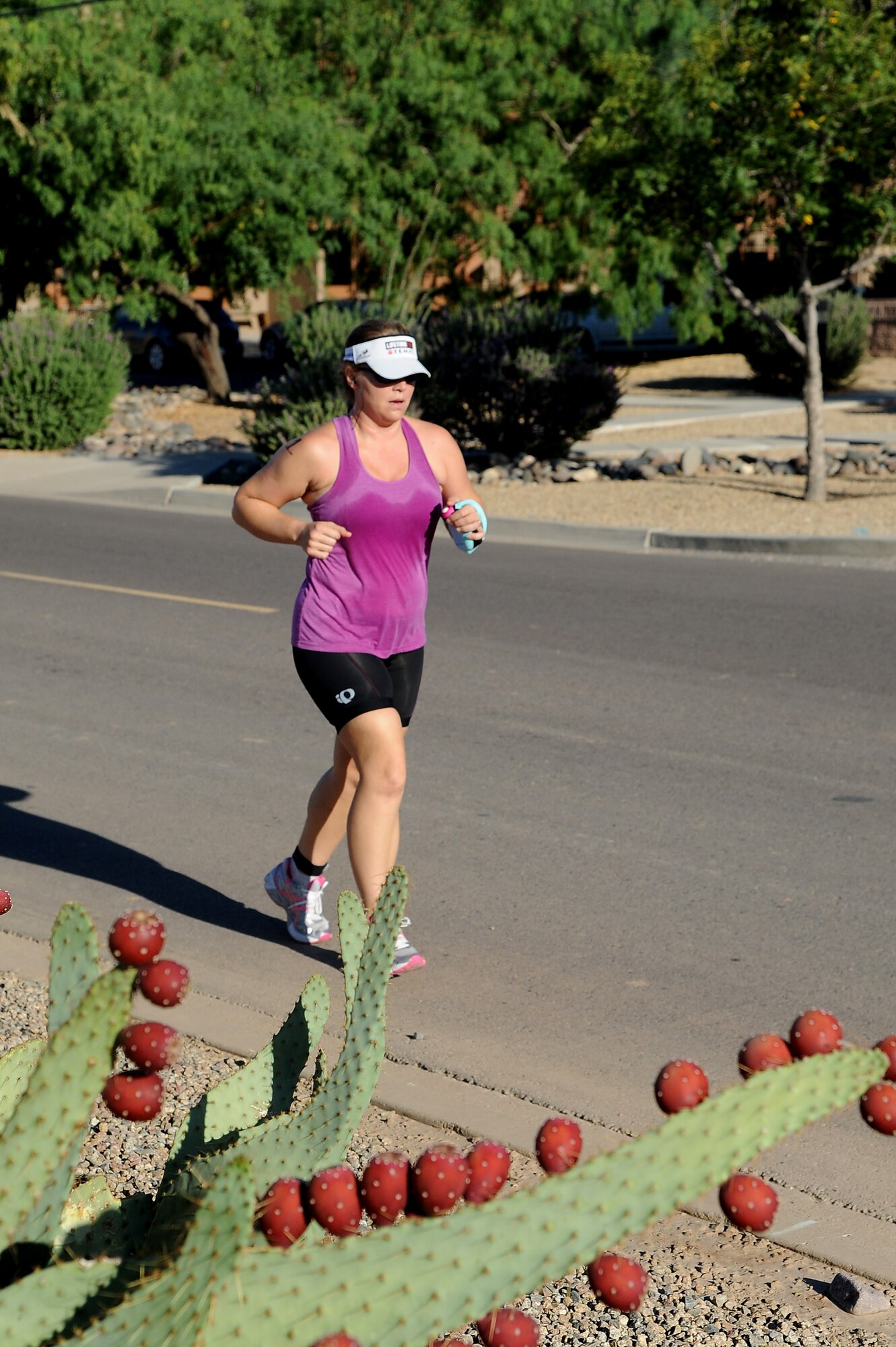 Lezlee Volk runs the 5k, the final event, in the Luke Air Force Base Fall Triathlon Saturday at Luke. Along with the 5k, competitors swam 400 meters and biked 11.4 miles. The Luke AFB Outdoor Recreation Center has hosted the fall triathlon for seven years. (U.S. Air Force photo/Airman 1st Class Pedro Mota)