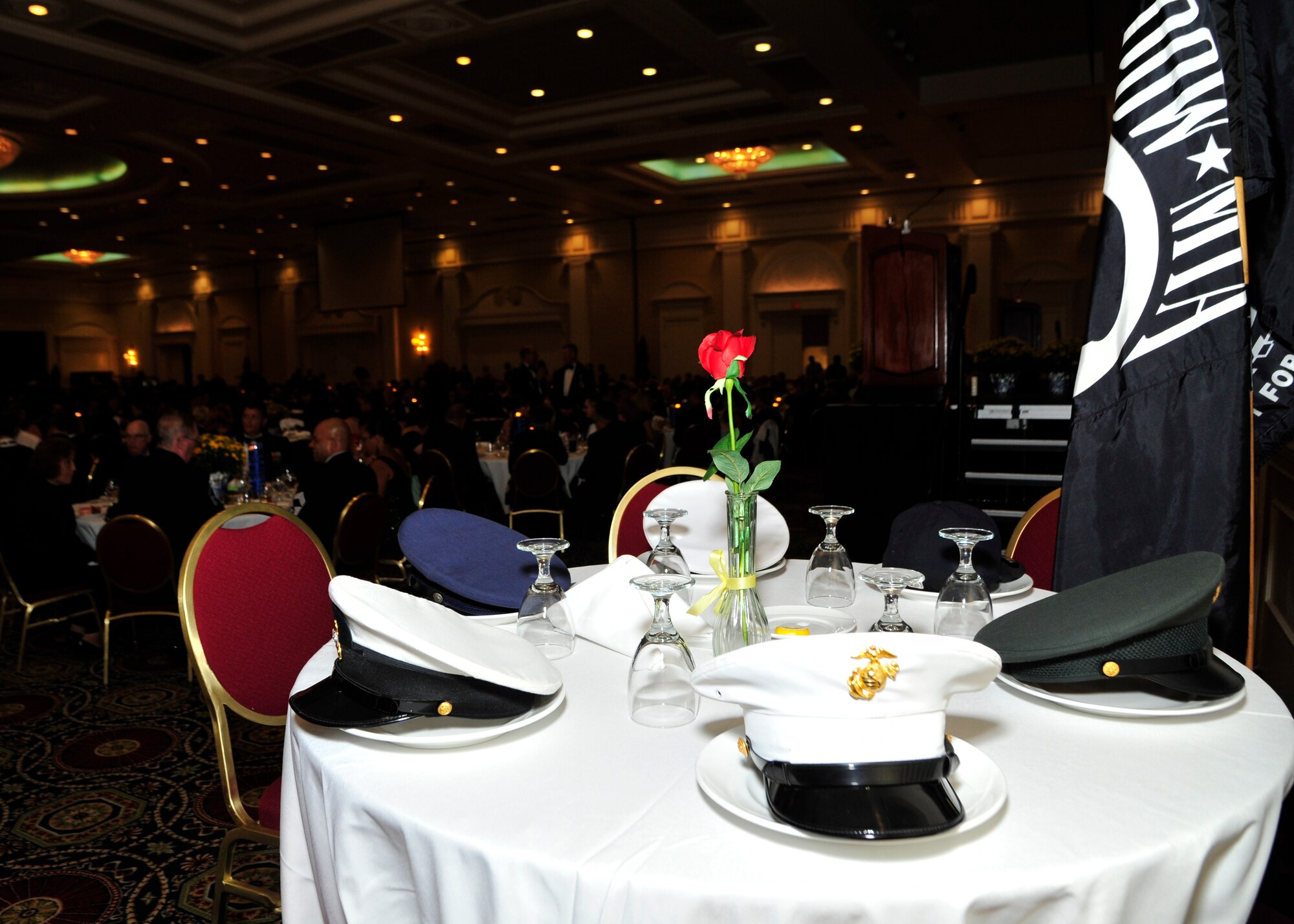 A POW/MIA “Missing Man” table is set at the 67th Air Force Ball Sept. 6, 2014, at Dover Downs in Dover, Del. The table is set for six, one for each branch of service, and represents personnel missing in action or taken prisoner of war. (U.S. Air Force photo/Airman 1st Class William Johnson)