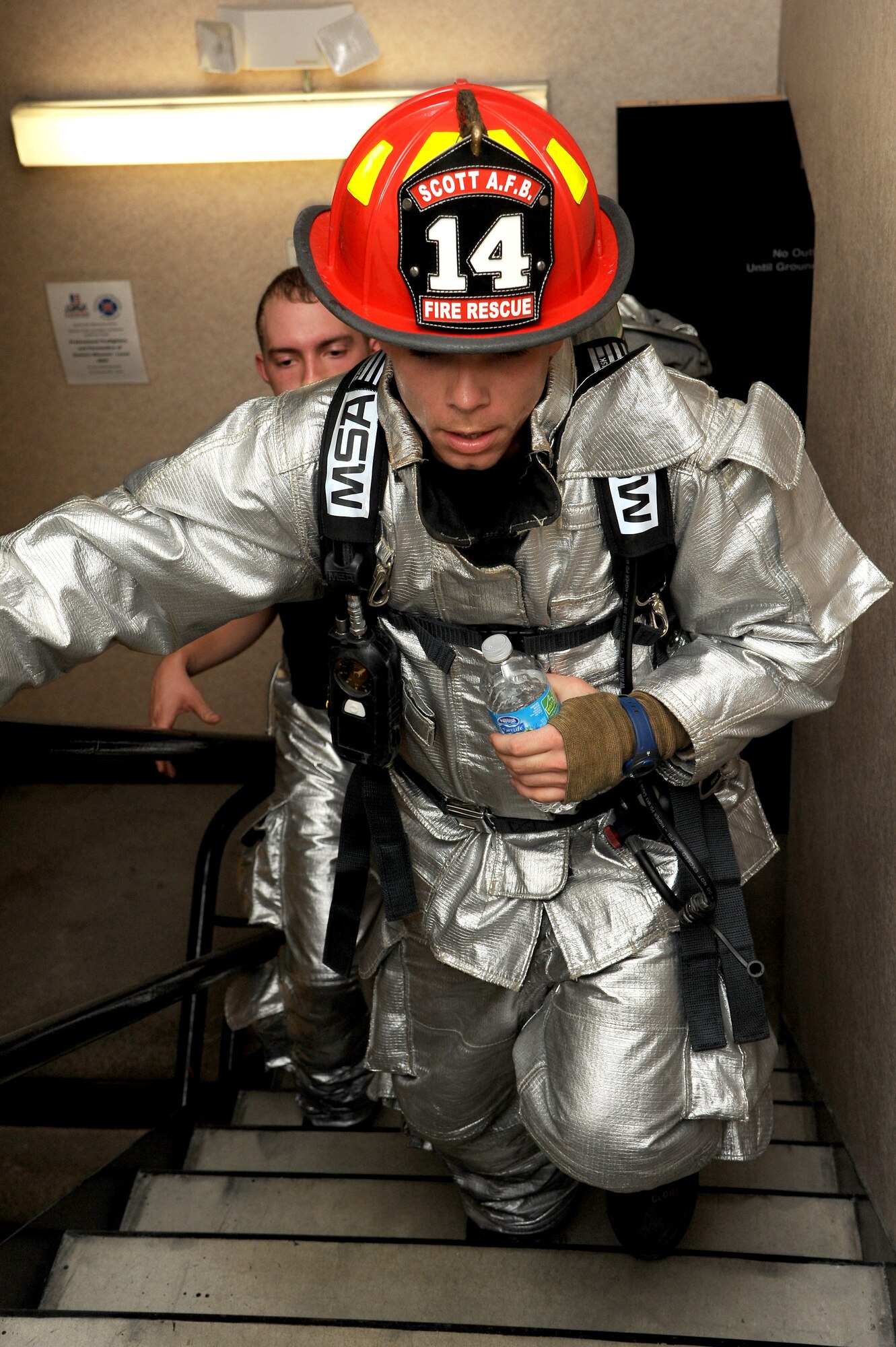 On September 7, 2014 firefighters and others gathered in Clayton, MO for a stair climb to honor fallen firefighters who gave their lives in the 9/11 attacks. Donations were gathered for the run and given towards the Fallen Firefighters Foundation, which not only helps support the families of the 9/11 survivors but also any fallen firefighter around the country with funeral costs, supporting their family and anything else they need. (U.S. Air Force photo/ Senior Airman Tristin English)