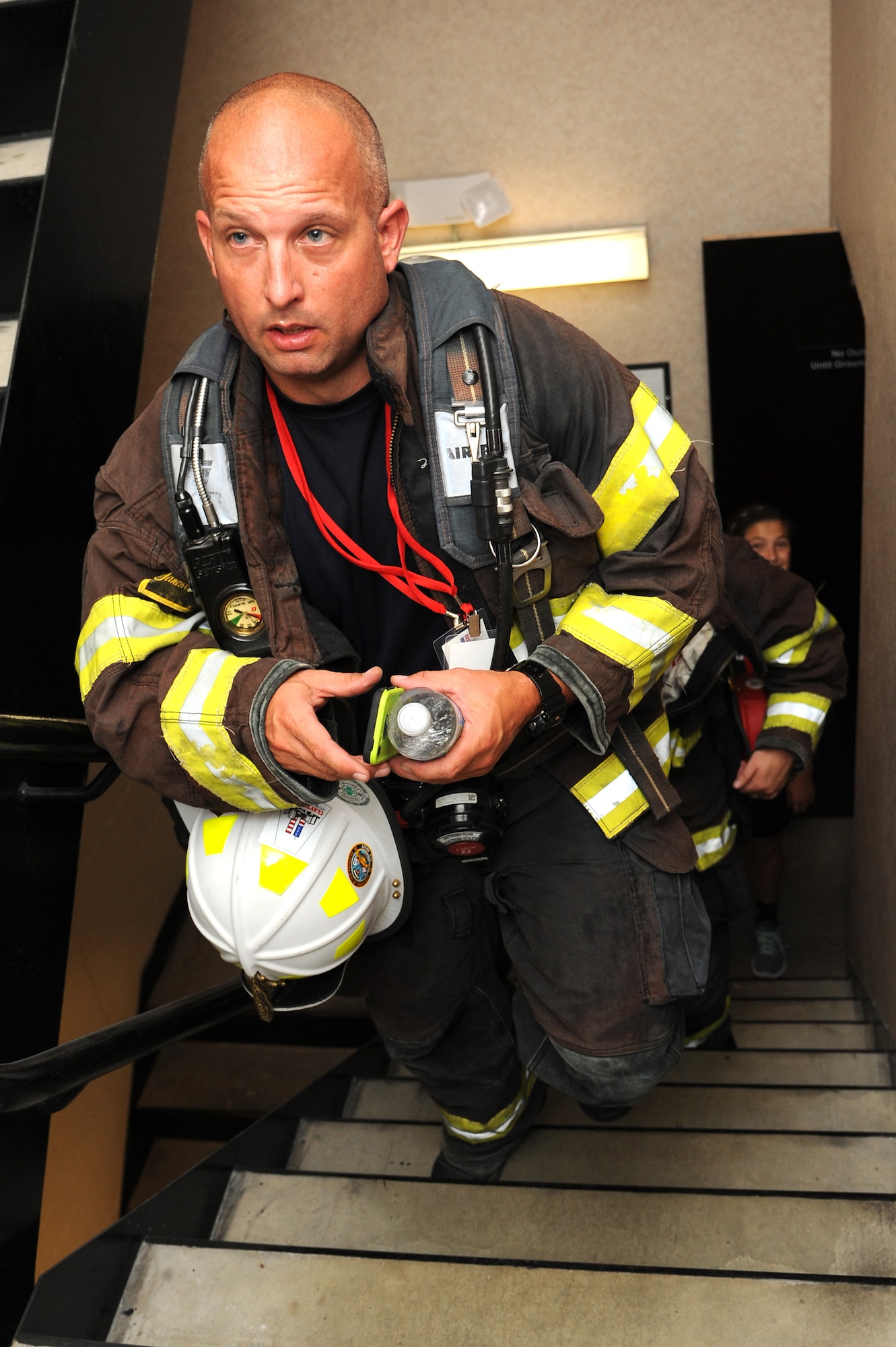 On September 7, 2014 firefighters and others gathered in Clayton, MO for a stair climb to honor fallen firefighters who gave their lives in the 9/11 attacks. Donations were gathered for the run and given towards the Fallen Firefighters Foundation, which not only helps support the families of the 9/11 survivors but also any fallen firefighter around the country with funeral costs, supporting their family and anything else they need. (U.S. Air Force photo/ Senior Airman Tristin English)
