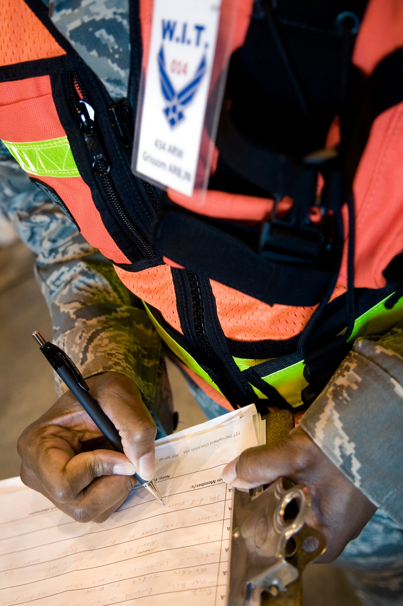 Senior Master Sgt. Kenneth C. Ferron II, 434th Air Refueling Wing inspections superintendent, makes observations as he inspects a mobility processing line during an exercise here July 12. Under the new Air Force Inspection System, major commands will no longer send large groups of inspectors to bases and units are responsible for inspecting themselves, which is a change. (U.S. Air Force photo/Tech. Sgt. Mark R. W. Orders-Woempner)