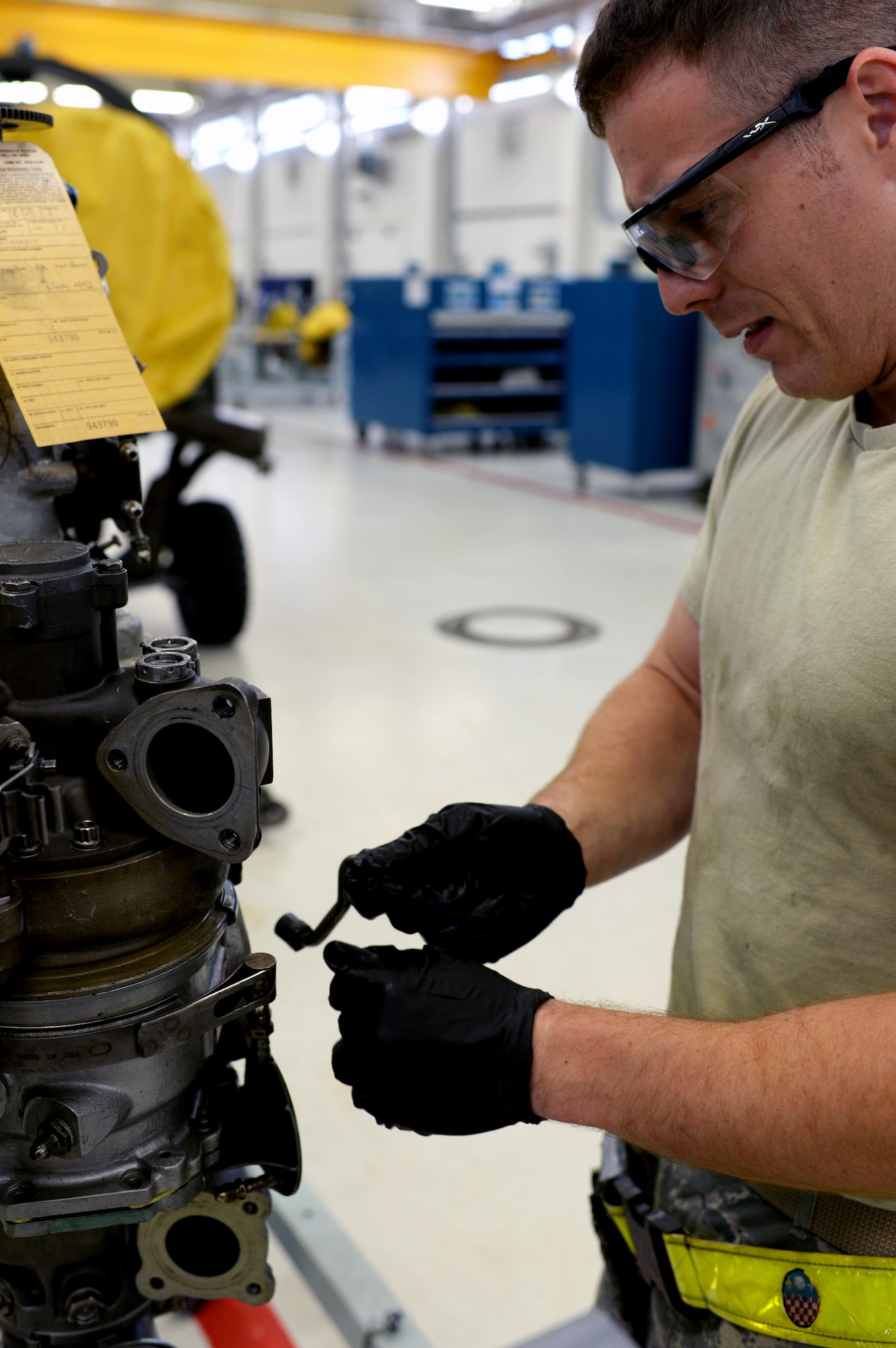 U.S. Air Force Staff Sgt. Willis Jensen, a 52nd Component Maintenance Squadron aerospace propulsion technician from Dana Point, Calif., works on an engine part in the propulsion shop at Spangdahlem Air Base, Germany, Sept. 9, 2014. The propulsion shop repairs components before sending them to a testing cell for a final inspection. (U.S. Air Force photo by Airman 1st Class Timothy Kim/Released)