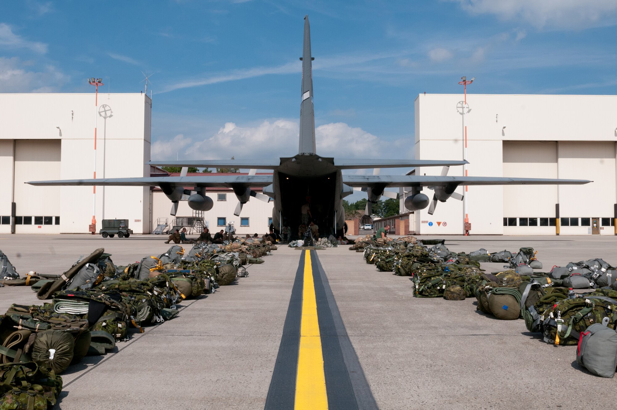 A Kentucky Air National Guard C-130 Hercules aircraft from the 123rd Airlift Wing sits on the flight line at Ramstein Air Base, Germany, awaiting the paratroopers it will carry to the Baltic region Sept. 5, 2014, in support of Operation Saber Junction. The U.S. and 16 other NATO allies are participating in the operation, designed to strengthen the partnerships and interoperability of NATO forces. (U.S. Air National Guard photo by 2nd Lt. James W. Killen/Released)