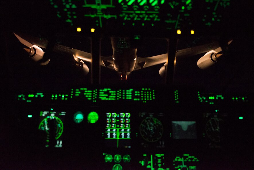 A KC-135 Stratotanker from Tennessee Air National Guard’s 134th Air Refueling Wing flies ahead of an HC-130J Combat King II to initiate aerial refueling in the Tennessee skies Sept. 4, 2014. The KC-135 has supplied a refueling capability for more than 50 years and supports the Air Force, Navy, Marine Corps and allied nation aircraft. (U.S. Air Force photo by Airman 1st Class Ryan Callaghan/Released)