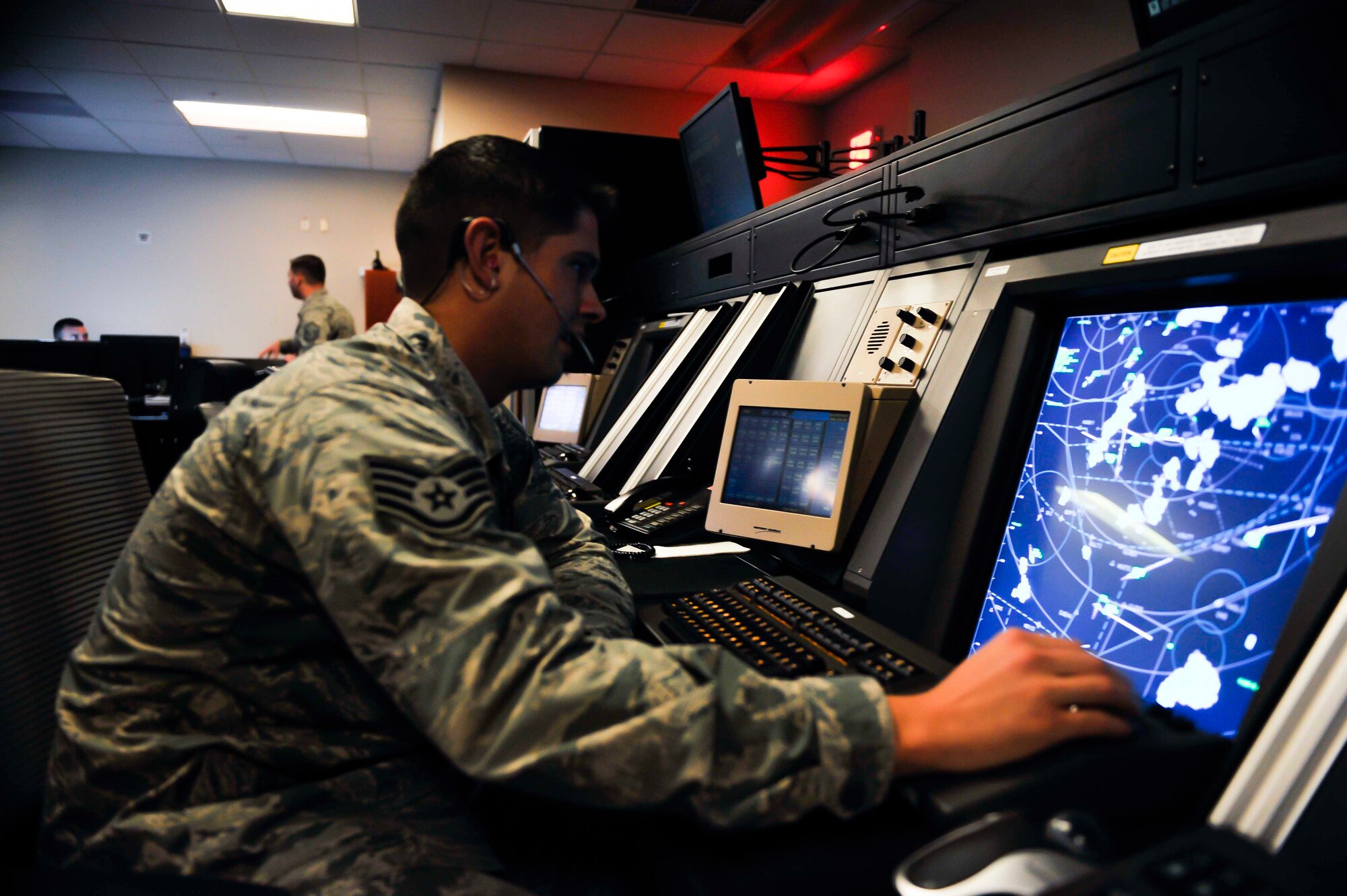 Staff Sgt. Benjamin Murphy, 51st Operations Support Squadron air traffic control watch supervisor, controls air traffic in the Osan radar approach facility on Osan Air Base, Republic of Korea, Sept. 3, 2014. Murphy is this week’s Airman Spotlight winner. (U.S. Air Force photo/Senior Airman David Owsianka)