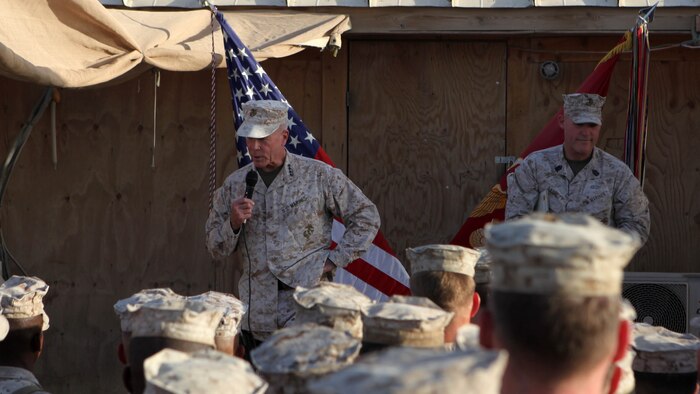 General James F. Amos, left, the 35th Commandant of the Marine Corps, and Sgt. Maj. Micheal Barrett, the 17th Sergeant Major of the Marine Corps, speak to Marines and sailors with 1st Battalion, 7th Marine Regiment; 1st Battalion, 2nd Marine Regiment; and 2nd Combat Engineer Battalion aboard Camp Leatherneck, Afghanistan, Sept. 6, 2014. Gen. Amos and Sgt. Maj. Barrett visited Marines and sailors serving with Marine Expeditionary Brigade – Afghanistan in Helmand province for the final time, thanking them for their service and sacrifice.