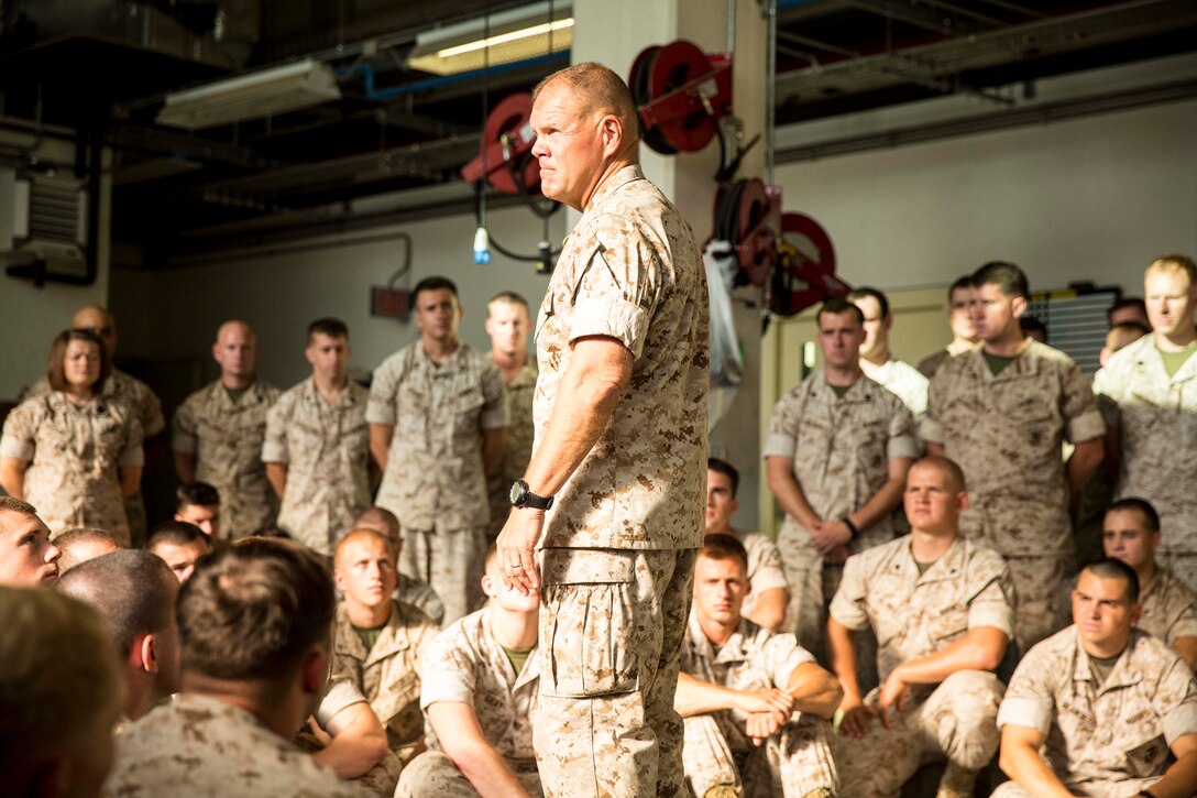 Lt. Gen. Robert Neller, the commanding general of Marine Corps Forces Command, visited Naval Air Station Sigonella to meet service members with the second iteration of SP-MAGTF Africa 14, Aug. 9, 2014. During his visit Neller spoke about current events in the area SP-MAGTF Africa operates in, allowed service members to ask him questions, and gave them words of encouragement and advice. (U.S. Marine Corps photo by Cpl. Shawn Valosin)