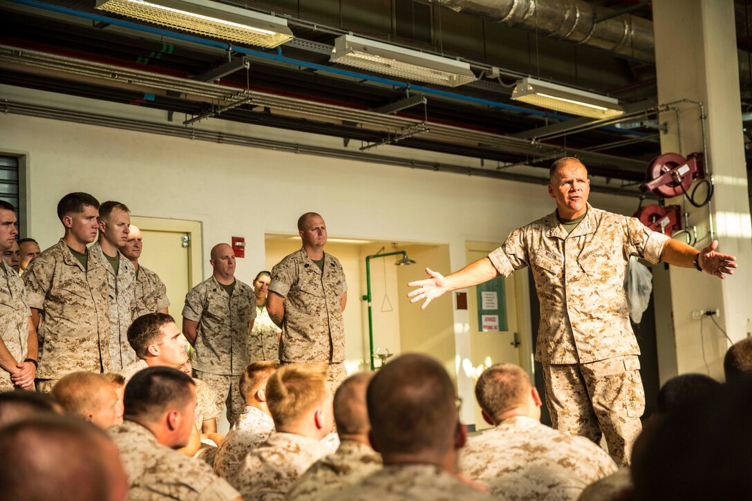 Lt. Gen. Robert Neller, the commanding general of Marine Corps Forces Command, visited Naval Air Station Sigonella to meet service members with the second iteration of SP-MAGTF Africa 14, Aug. 9, 2014. Neller thanked the members of SP-MAGTF Africa for their service and wished them good luck on their upcoming missions. (U.S. Marine Corps photo by Cpl. Shawn Valosin)
