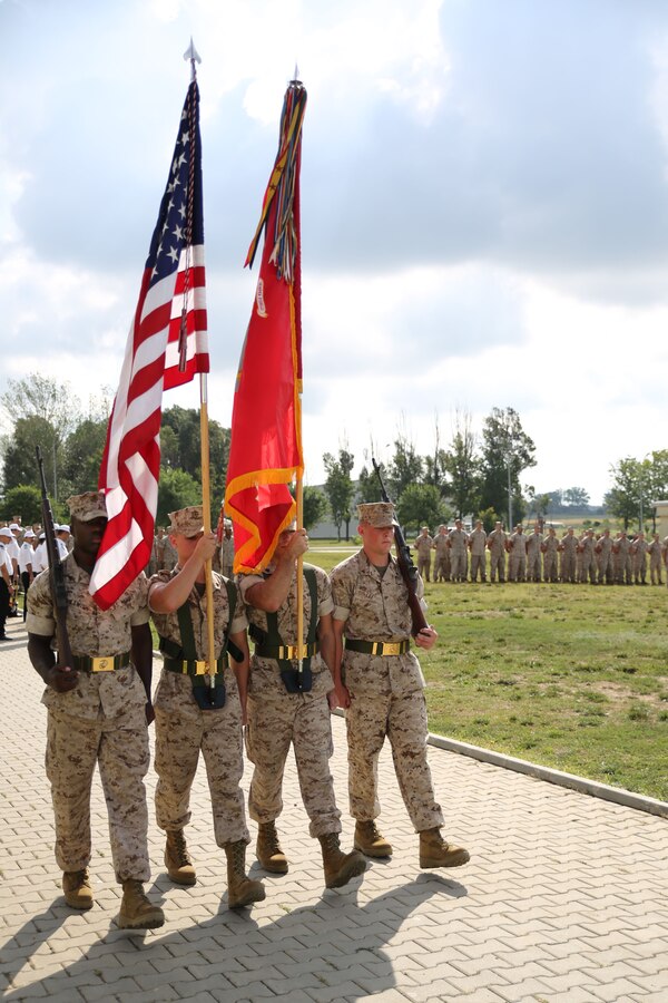 U.S Marines of 3rd Battalion, 8th Marine Regiment, 2nd Marine Division and 2nd Battalion, 2nd Marine Regiment, 2nd Marine Division held a ceremony to mark the turnover of a new iteration of Black Sea Rotational Force on Mihail Kogalniceanu Air Base, Romania, Aug. 21, 2014. 2/2 will be taking 3/8’s place for the winter rotation of BSRF. (U.S. Marine Corps photo by Lance Cpl. Ryan Young/released)