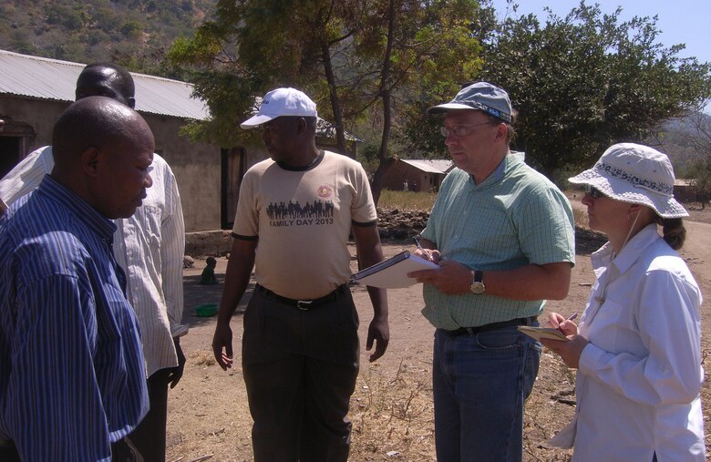 TANROADS engineers in Tanzania discuss the road assessments with Danny Klima, civil engineer, Omaha District USACE and Vanessa Pepi, wildlife biologist from the environmental branch in Wiesbaden, Germany, Europe District USACE. 