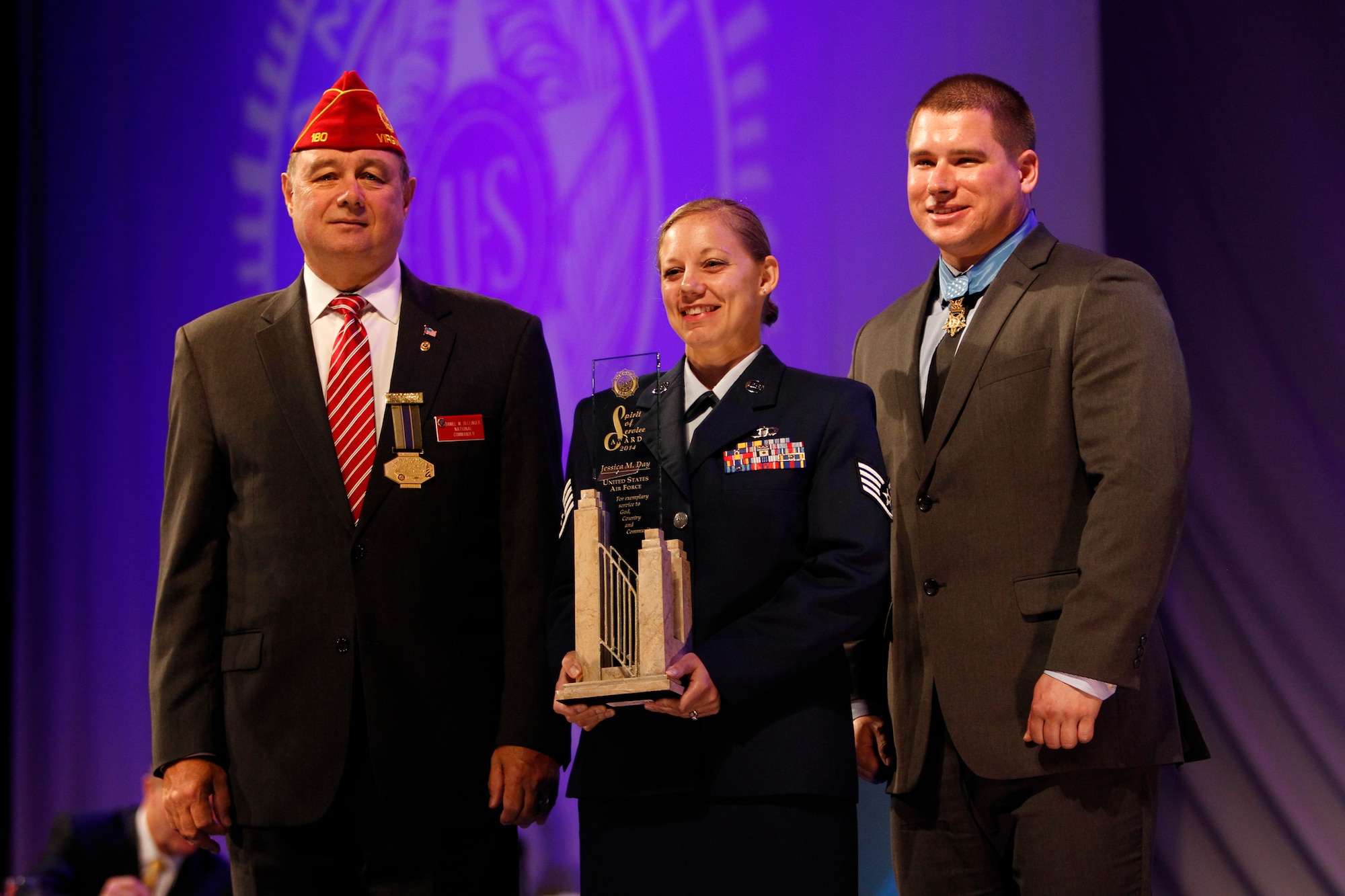 Staff Sgt. Jessica M. Day smiles for a photo after receiving the American Legion Spirit of Service Award at the Legion’s National Convention Aug. 26, 2014, in Charlotte, North Carolina. The award is sponsored by the National Headquarters of the American Legion and is presented annually to an enlisted member from each of the military services for outstanding volunteer service performed off-duty in the local community. Day is a 366th Operations Support Squadron air traffic control craftsman  (Courtesy photo)
