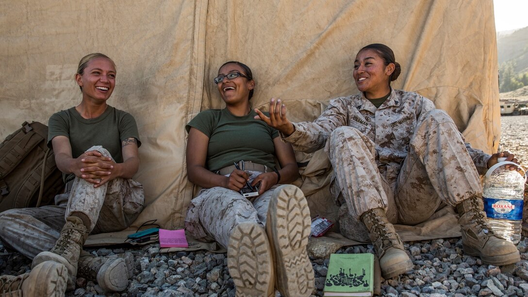 U.S. Marine Cpl. Monica M. Coleman, right, relaxes after work with fellow Marines aboard Marine Corps Warfare Training Center in Bridgeport, Calif., Sept. 6, 2014. Coleman, 20, is from San Antonio, and is a motor-transportation operator with Headquarters and Service Battalion, 1st Marine Regiment, 1st Marine Division. (U.S. Marine Corps photo by Sgt. Emmanuel Ramos/Released)