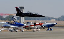 A L-39 Albatross from the Patriots Jet Demonstration Team performs a low-level pass during the California Capital Airshow in Sacramento, Calif., Sept. 6, 2014. The Patriots are a civilian-owned jet aerobatic team. (U.S. Air Force photo by Staff Sgt. Robert M. Trujillo/Released)