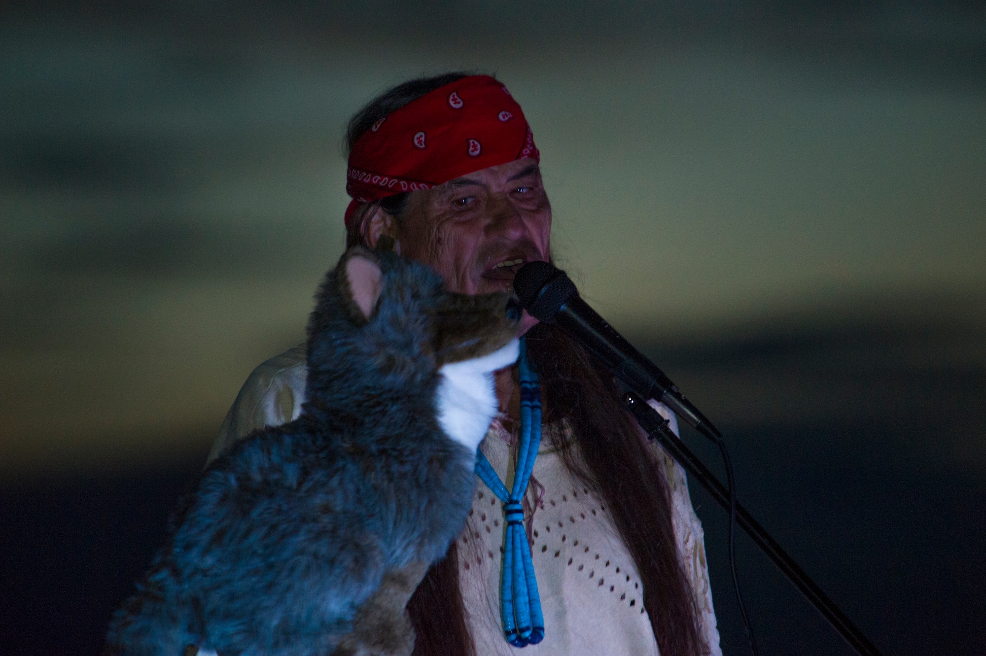 Ernie Dogwolf Lovato, a musician, story teller and native New Mexican, uses a puppet to help tell a story during his Full Moon Night performance at White Sands National Monument, Sept. 8. White Sands National Monument hosts a monthly full moon night event where various featured guests and activities are planned for the guests to enjoy under a rising full moon. (U.S. Air Force photo by Airman 1st Class Aaron Montoya / Released)