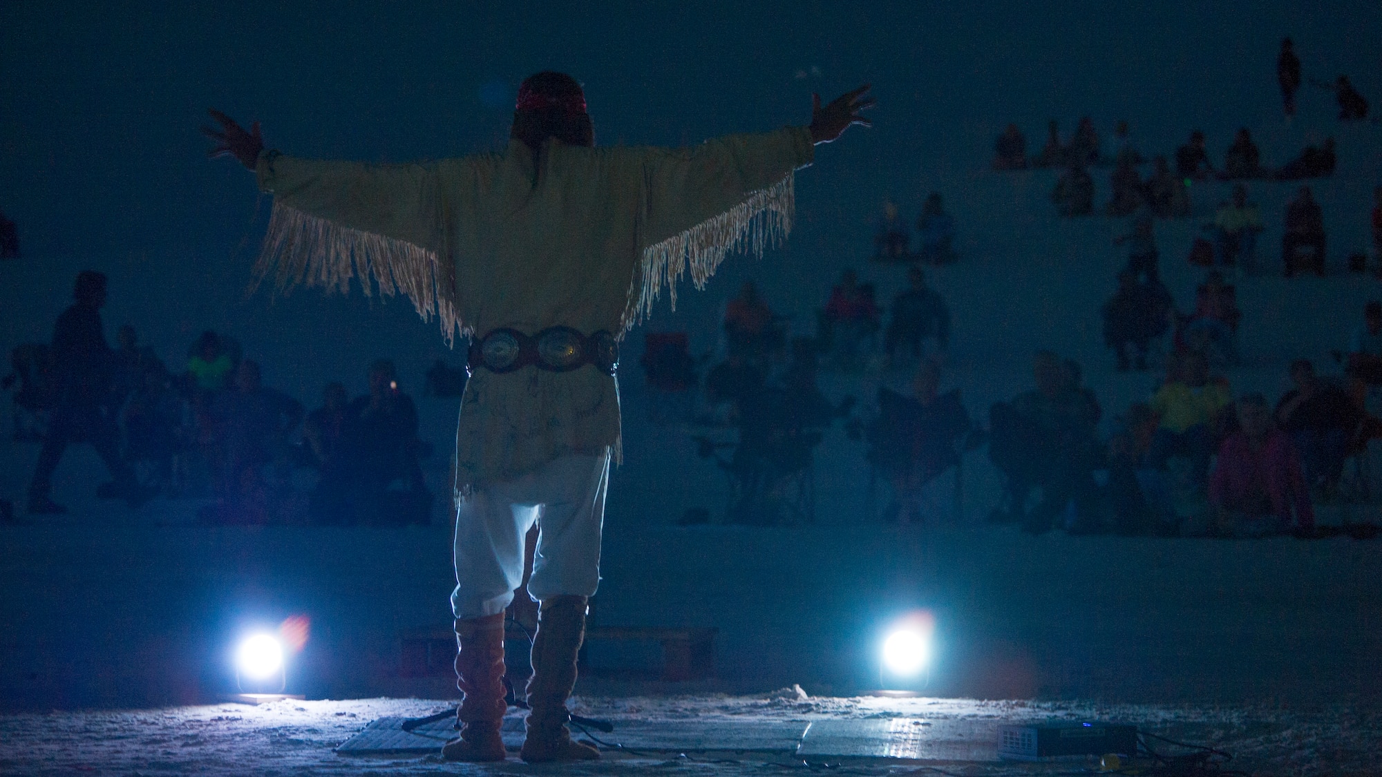 Ernie Dogwolf Lovato, a musician, story teller and native New Mexican, tells a story during his Full Moon Night performance at White Sands National Monument, Sept. 8. White Sands National Monument hosts a monthly full moon night event where various featured guests and activities are planned for the guests to enjoy under a rising full moon. (U.S. Air Force photo by Airman 1st Class Aaron Montoya / Released)