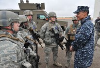Adm. Cecil D. Haney, U.S. Strategic Command commander, right, talks with 341st Security Forces Group members Sept. 9 during a missile convoy display at Malmstrom Air Force Base, Mont. Shown with the admiral are Airman 1st Class Randi Law, Staff Sgt. Sydney Farries, Senior Airman Justin Parker, and Staff Sgt. Joseph Geib, all 741st Missile Security Forces Squadron members, and Staff Sgt. Hector Rivera-Bonilla, 341st SFG tactical response force member. USSTRATCOM is one of nine DoD unified combatant commands and is charged with strategic deterrence, space operations, cyberspace operations, joint electronic warfare, global strike, missile defense, intelligence, surveillance and reconnaissance, combating weapons of mass destruction, and analysis and targeting. (U.S. Air Force photo/John Turner)