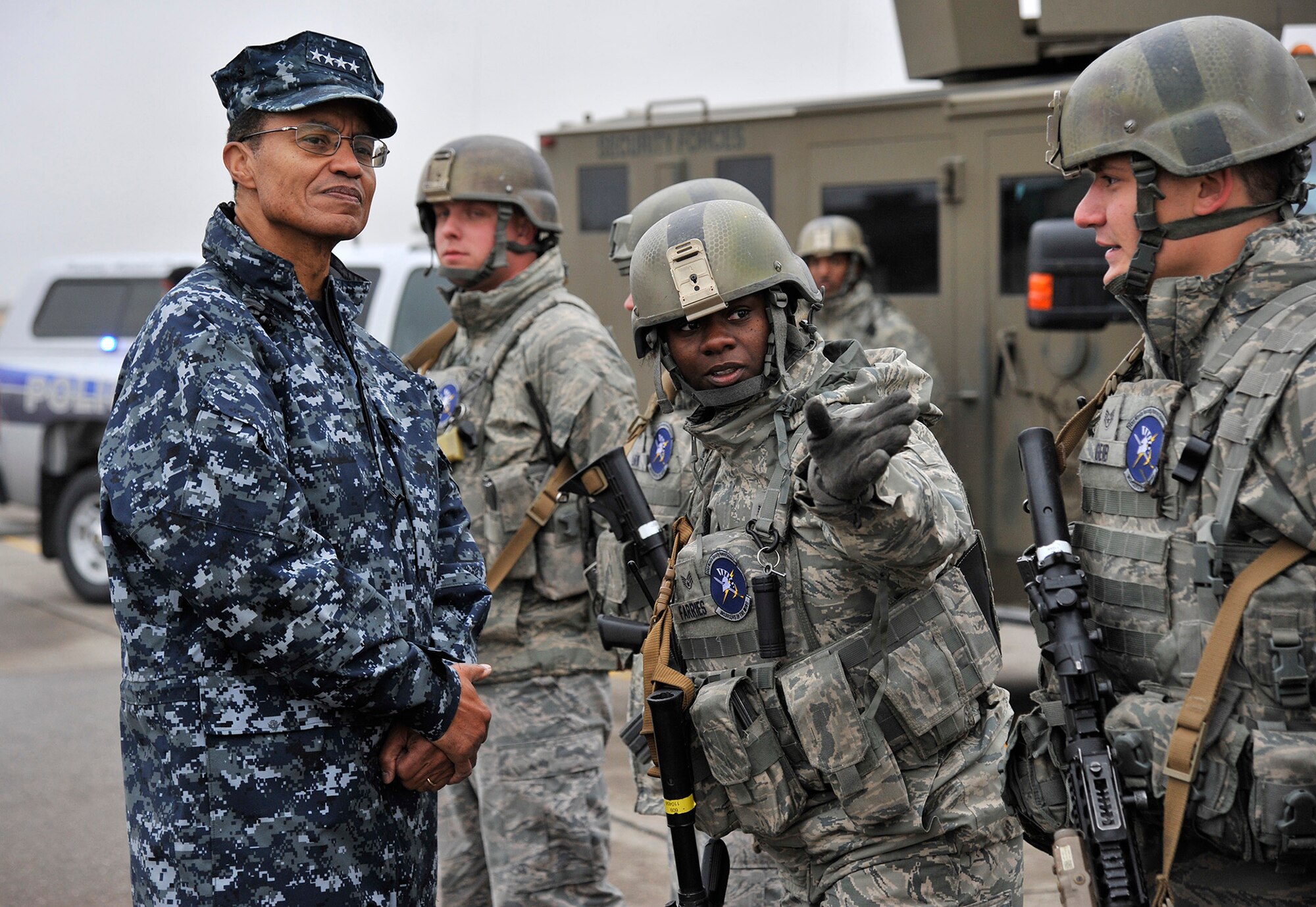 Staff Sgt. Sydney Farries, 741st Missile Security Forces Squadron security forces member, gives a mission brief to Adm. Cecil D. Haney, U.S. Strategic Command commander, left, Sept. 9 during a missile convoy display at Malmstrom Air Force Base, Mont. USSTRATCOM is one of nine DoD unified combatant commands and is charged with strategic deterrence, space operations, cyberspace operations, joint electronic warfare, global strike, missile defense, intelligence, surveillance and reconnaissance, combating weapons of mass destruction, and analysis and targeting. (U.S. Air Force photo/John Turner)