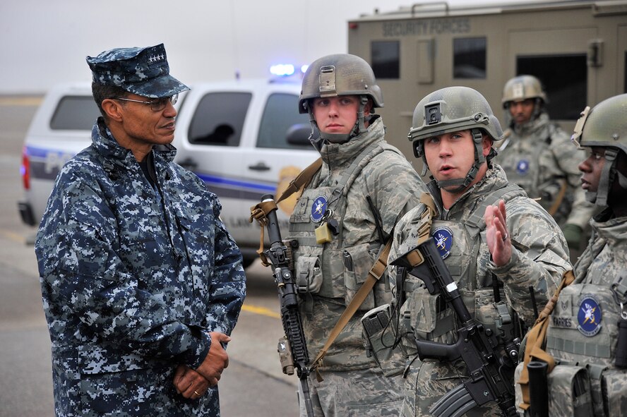 Airman 1st Class Randi Law, 741st Missile Security Forces Squadron security forces member, gives a mission brief to Adm. Cecil D. Haney, U.S. Strategic Command commander, left, Sept. 9 during a missile convoy display at Malmstrom Air Force Base, Mont. USSTRATCOM is one of nine DoD unified combatant commands and is charged with strategic deterrence, space operations, cyberspace operations, joint electronic warfare, global strike, missile defense, intelligence, surveillance and reconnaissance, combating weapons of mass destruction, and analysis and targeting. (U.S. Air Force photo/John Turner)