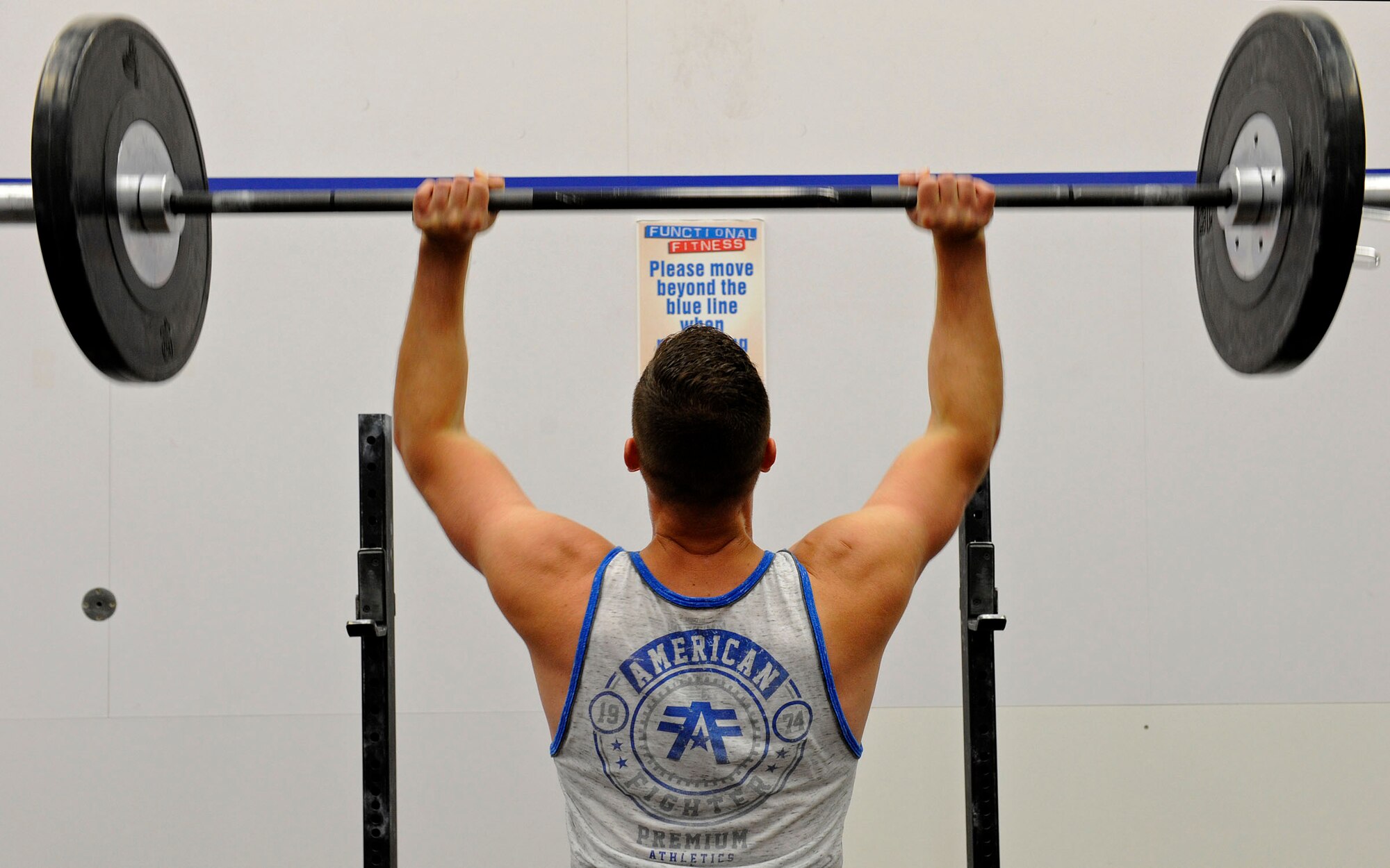 U.S. AIR FORCE ACADEMY, Colo. – Master Sgt. Benjamin “Paul” Horton, 21st Civil Engineer Squadron explosive ordnance disposal program manager, completes an overhead press at the Academy Fitness Center Sept. 3. Horton is training for the first-ever Invictus Games, which will take place in London Sept. 10-14. The Games will help combat warriors prove they still have a purpose and cannot be defeated just from being wounded in combat. (U.S. Air Force photo/Airman 1st Class Rose Gudex)