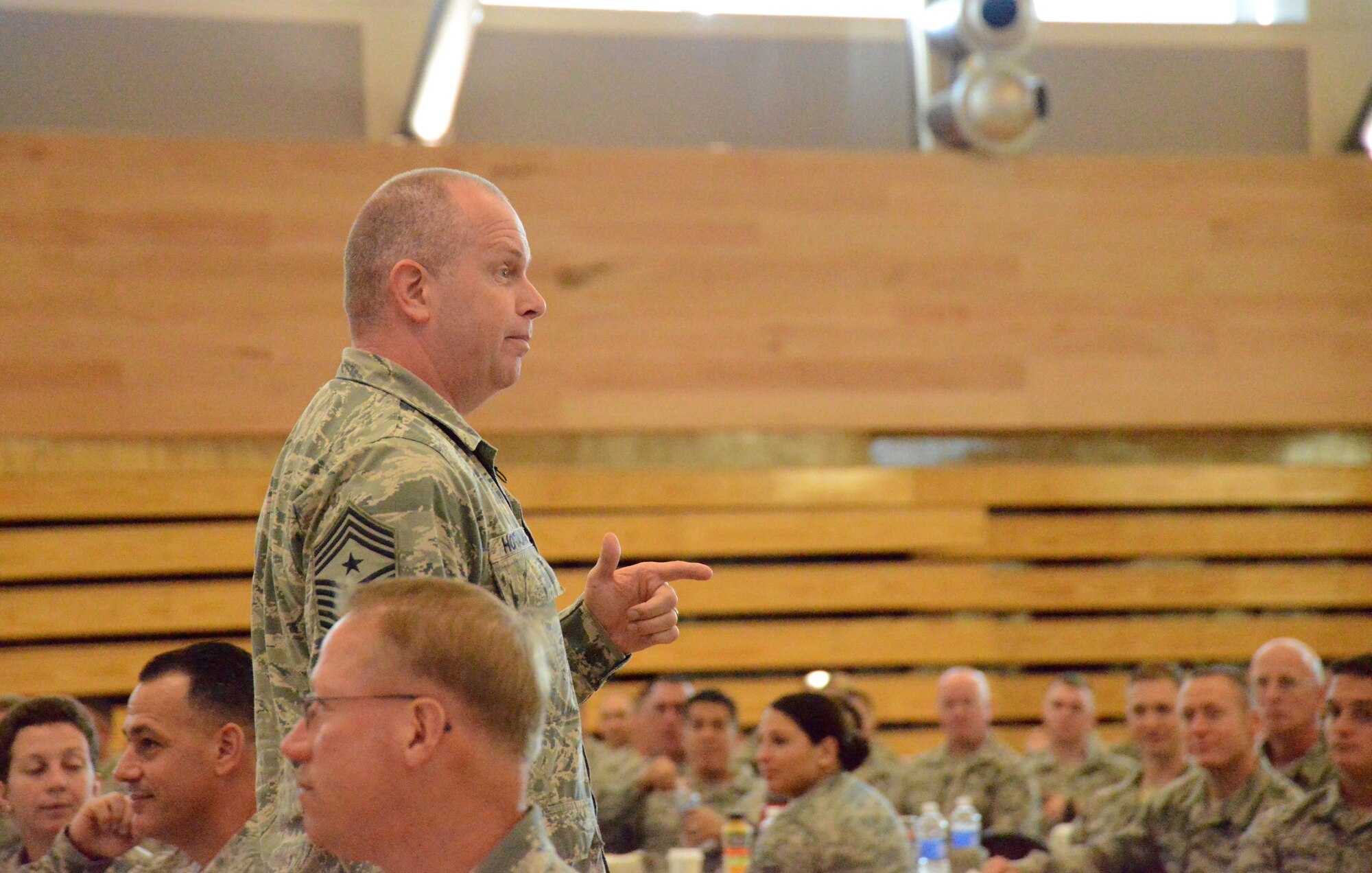Chief Master Sgt. James W. Hotaling, the command chief master sergeant of the Air National Guard, addresses Airmen at the Enlisted Leadership Symposium, held at Camp Dawson, W.V., Aug. 26-28, 2014. Airmen from each of the 50 states, territories and the District of Columbia are in attendance for three days of professional development and leadership training. (U.S. Air National Guard photo by Senior Airman John E. Hillier)