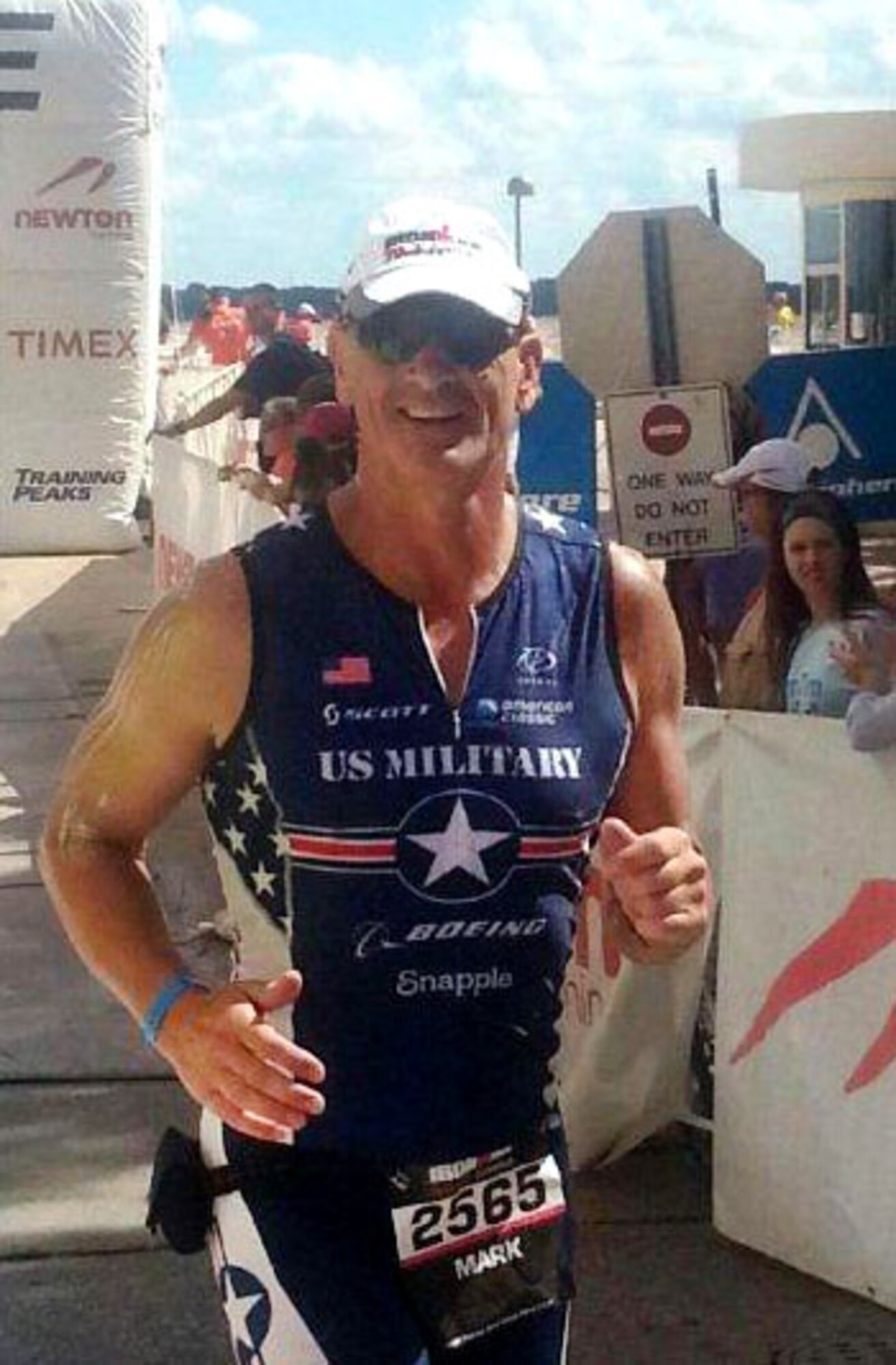 Lt. Col. Mark Kelly, a traditional Reservist pilot with the 303d Fighter Wing, competes in his first Ironman triathlon on Sept. 7. Kelly completed the race in 12 hours to celebrate his 50th birthday and retirement from the Air Force. (photo submitted by Lt. Col. Mark Kelly) 
