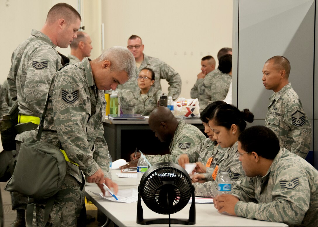 TRAVIS AIR FORCE BASE, Calif. -- 60th and 349th Air Mobility Wing members participated in a "position the force exercise, Sept. 6, 2014 (U.S. Air Force photo / Staff Sgt. Amelia Leonard)