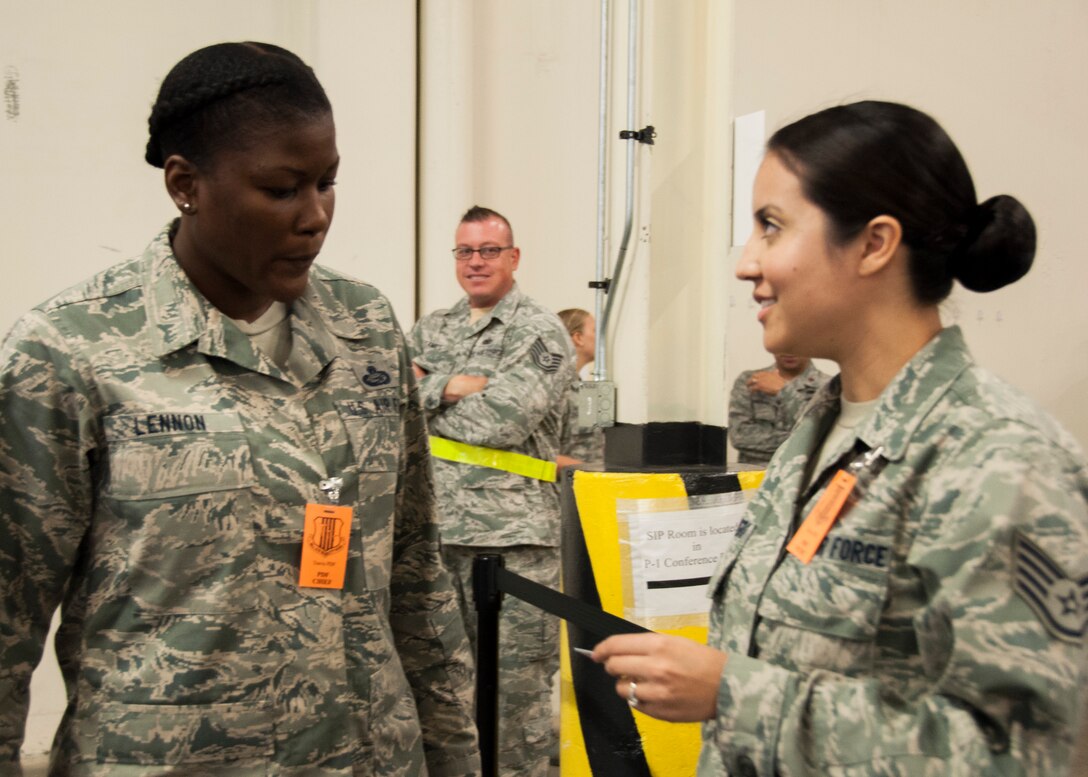 TRAVIS AIR FORCE BASE, Calif. -- 60th and 349th Air Mobility Wing members participated in a "position the force exercise, Sept. 6, 2014 (U.S. Air Force photo / Staff Sgt. Amelia Leonard)