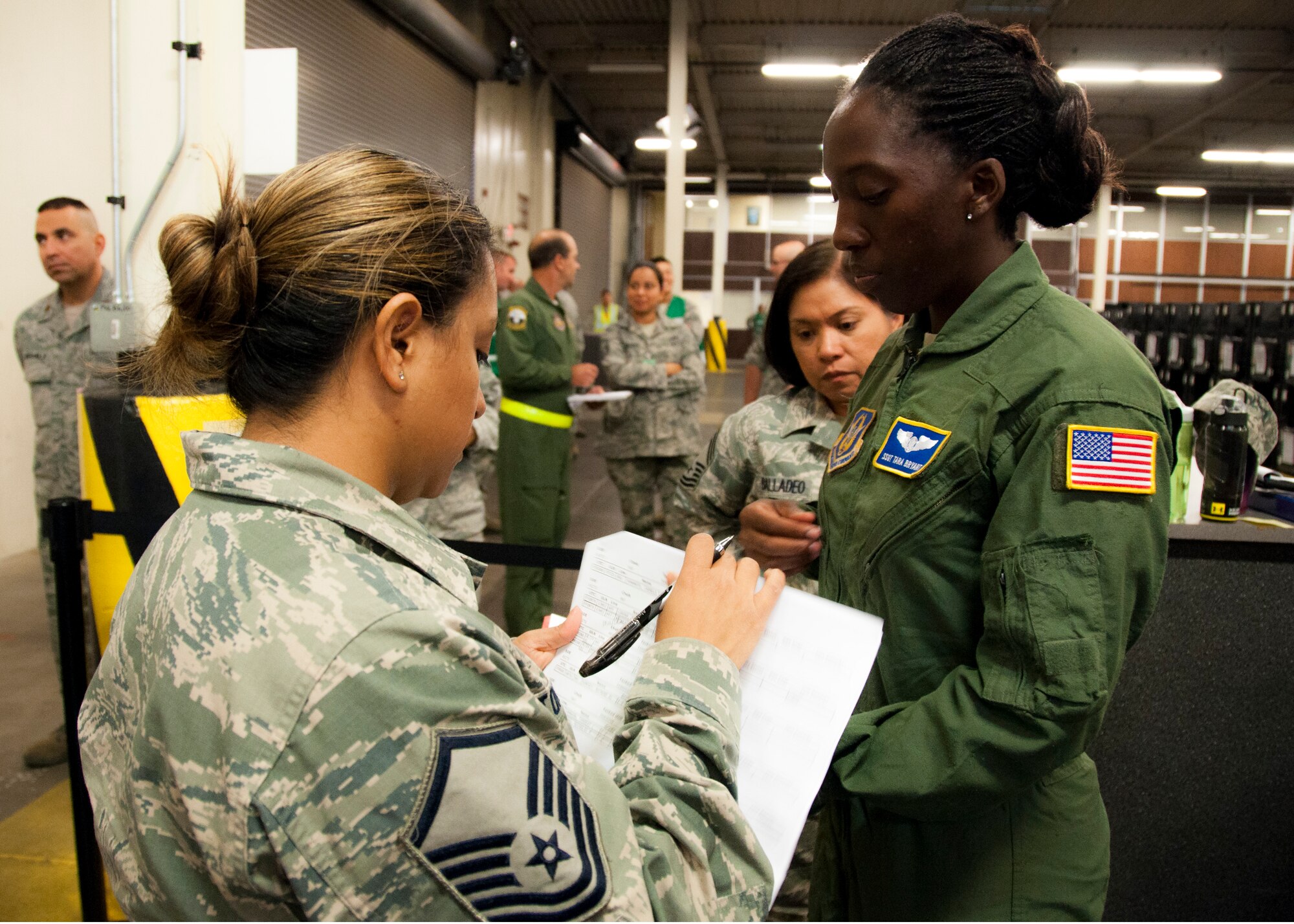 TRAVIS AIR FORCE BASE, Calif. -- 60th and 349th Air Mobility Wing members participated in a "position the force exercise, Sept. 6, 2014 (U.S. Air Force photo / Staff Sgt. Amelia Leonard)