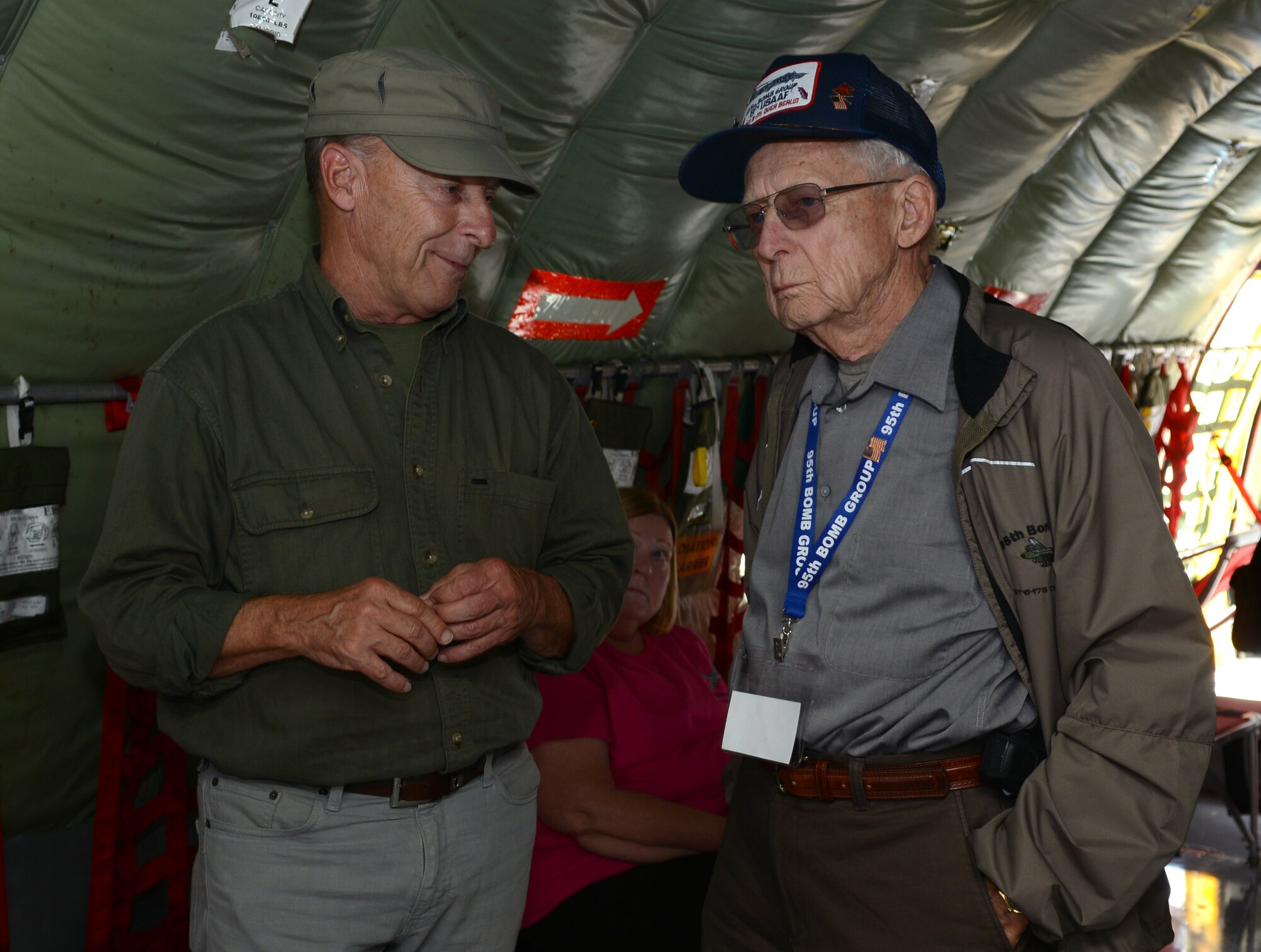 World War II veteran Bob Fay, 89, right, speaks to a member of a reunion group during a tour of a KC-135 Stratotanker Sept. 9, 2014, on RAF Mildenhall, England. Fay served in the Army Air Corps as a ball-turret gunner during World War II. (U.S. Air Force photo/Airman 1st Class Dillon Johnston/Released)