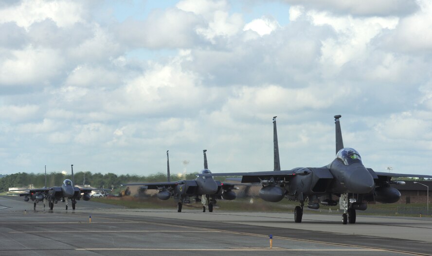 F-15E Strike Eagles taxi during exercise Razor Talon on Sep. 5 at Seymour Johnson Air Force Base, North Carolina. During the exercise, 14 Strike Eagles assigned to Seymour Johnson AFB joined 33 aircraft from several installations on the East Coast including Joint Base Langley-Eustis, Virginia, Shaw Air Force Base, South Carolina, and Marine Corps Air Station Cherry Point, North Carolina. (U.S. Air Force photo/Airman 1st Class Aaron J. Jenne)