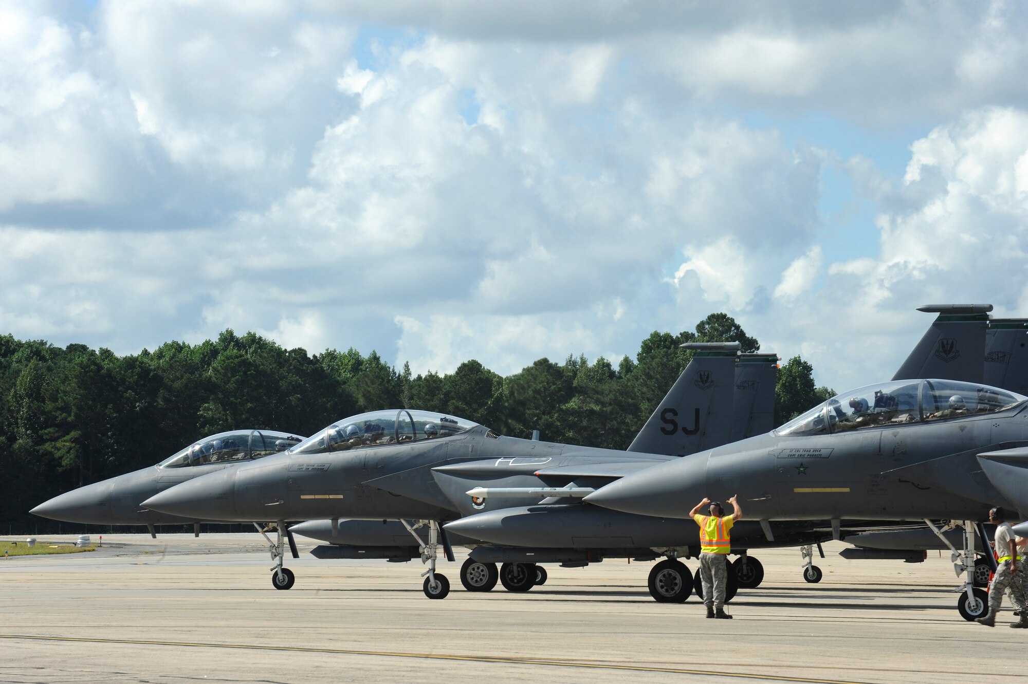 F-15E Strike Eagles line up on the runway during exercise Razor Talon on Sep. 5 at Seymour Johnson Air Force Base, North Carolina. Razor Talon is a monthly low-cost, large-force training opportunity for joint East Coast tactical and support aviation units. (U.S. Air Force photo/Airman 1st Class Aaron J. Jenne)