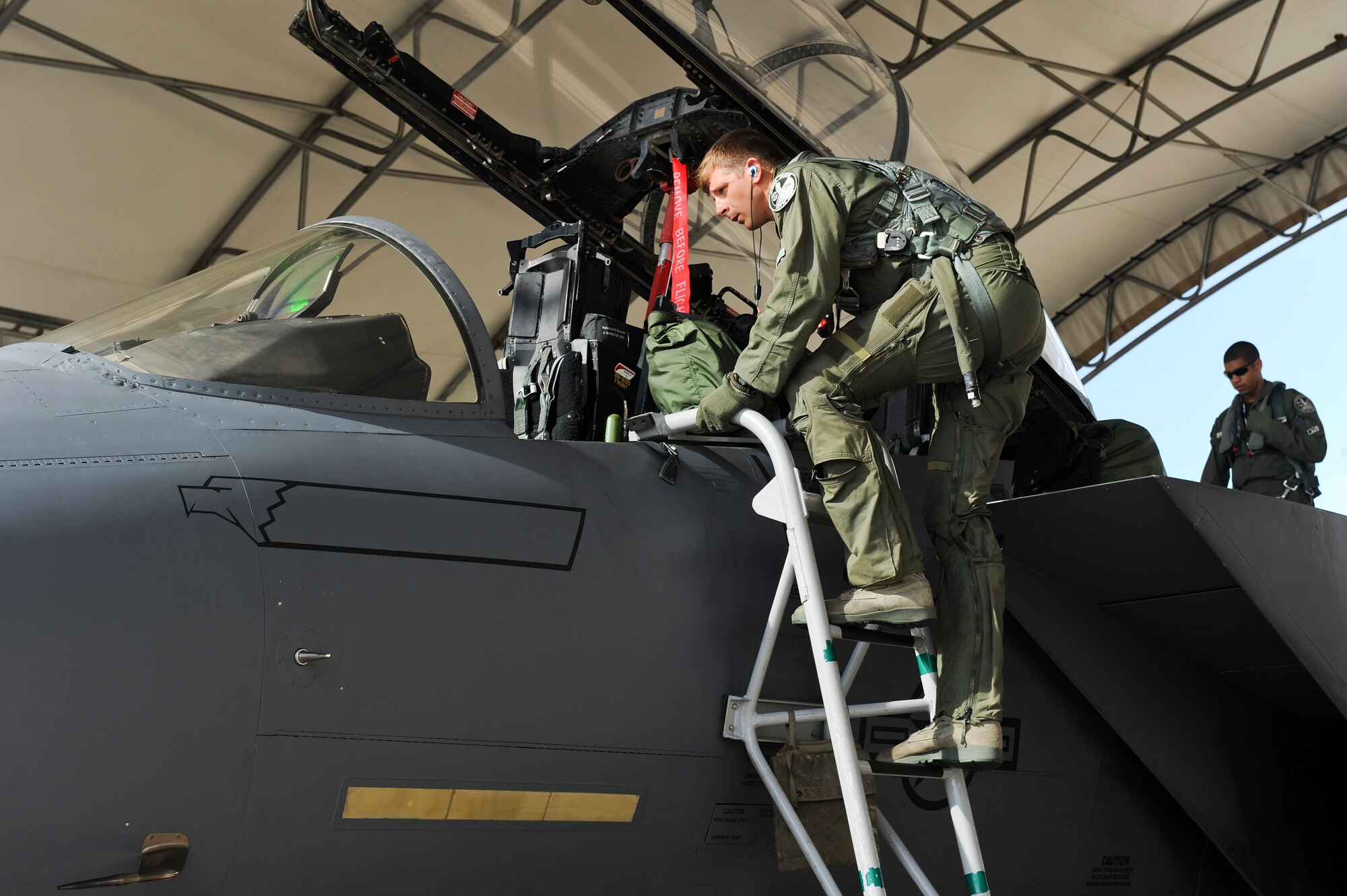 First Lt. Kevin Fogler, 335th Fighter Squadron F-15E Strike Eagle pilot, climbs into his jet during Razor Talon on Sep. 5 at Seymour Johnson Air Force Base, North Carolina. During the exercise, 14 Strike Eagles assigned to Seymour Johnson AFB joined 33 aircraft from several installations on the East Coast including Joint Base Langley-Eustis, Virginia, Shaw Air Force Base, South Carolina, and Marine Corps Air Station Cherry Point, North Carolina. (U.S. Air Force photo/Airman 1st Class Aaron J. Jenne)