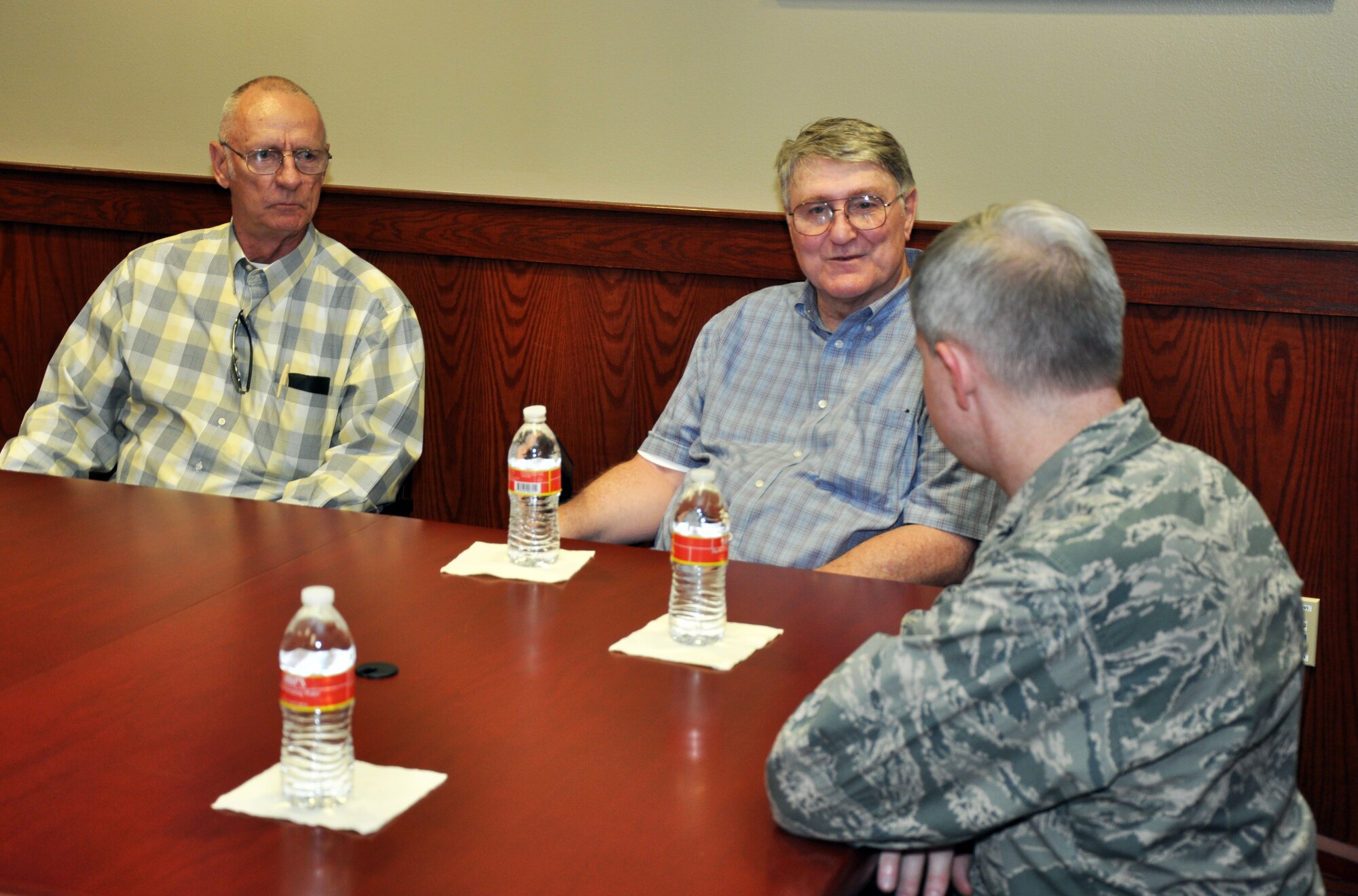GOODFELLOW AIR FORCE BASE, Texas – Retired Air Force Col. Donald R. Spoon and Retired Air Force Lt. Col. Thomas Walsh, Vietnam War veterans, visit with Col. Terry J. Hamrick Jr., 17th Training Wing Vice Commander, at the Norma Brown Building Sept. 2. Spoon and Walsh also attended an officer training course session where they participated in a Q-and-A on their experiences. Spoon flew approximately 40 missions in Vietnam, before being shot down and captured. He was a prisoner of war for six years. Walsh was shot down on a tour to Ubon, Thailand, but the Navy picked him up at the Gulf of Tonkin, Vietnam. (U.S. Air Force photo/ Senior Airman Joshua Edwards)
