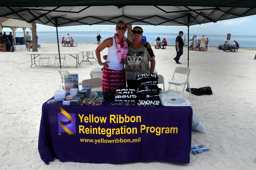 The 927 ARW hosted its annual family day 6 Sept. at the beach on MacDill AFB. Reservists and their family members enjoyed an afternoon of fun which included a barbeque, volleyball, dunk booth, and a car show. In addition to these activities families were given a demonstration by the 6 AMW military working dog handlers, and offered information from representatives of The Yellow Ribbon Program and Employer Support of Guard and Reserve (ESGR). (U.S. Air Force Photo / SSgt Adam C. Borgman)

