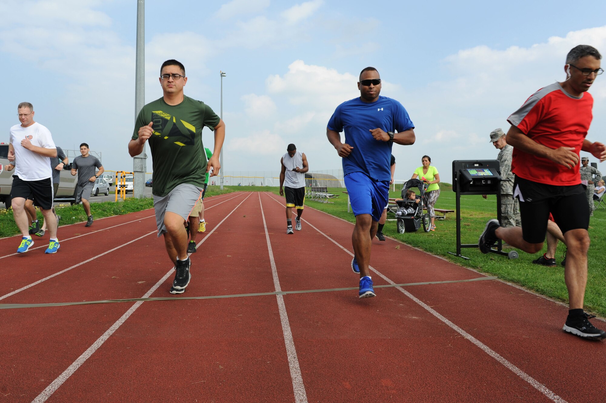 Participants start the 5K run during the 2014 Combined Federal Campaign-Overseas kickoff event Sept. 8, 2014, at Spangdahlem Air Base, Germany. The 52nd Fighter Wing’s CFC-O goal for 2014 is to achieve at least 25 percent participation. (U.S. Air Force photo by Airman 1st Class Dylan Nuckolls/Released)