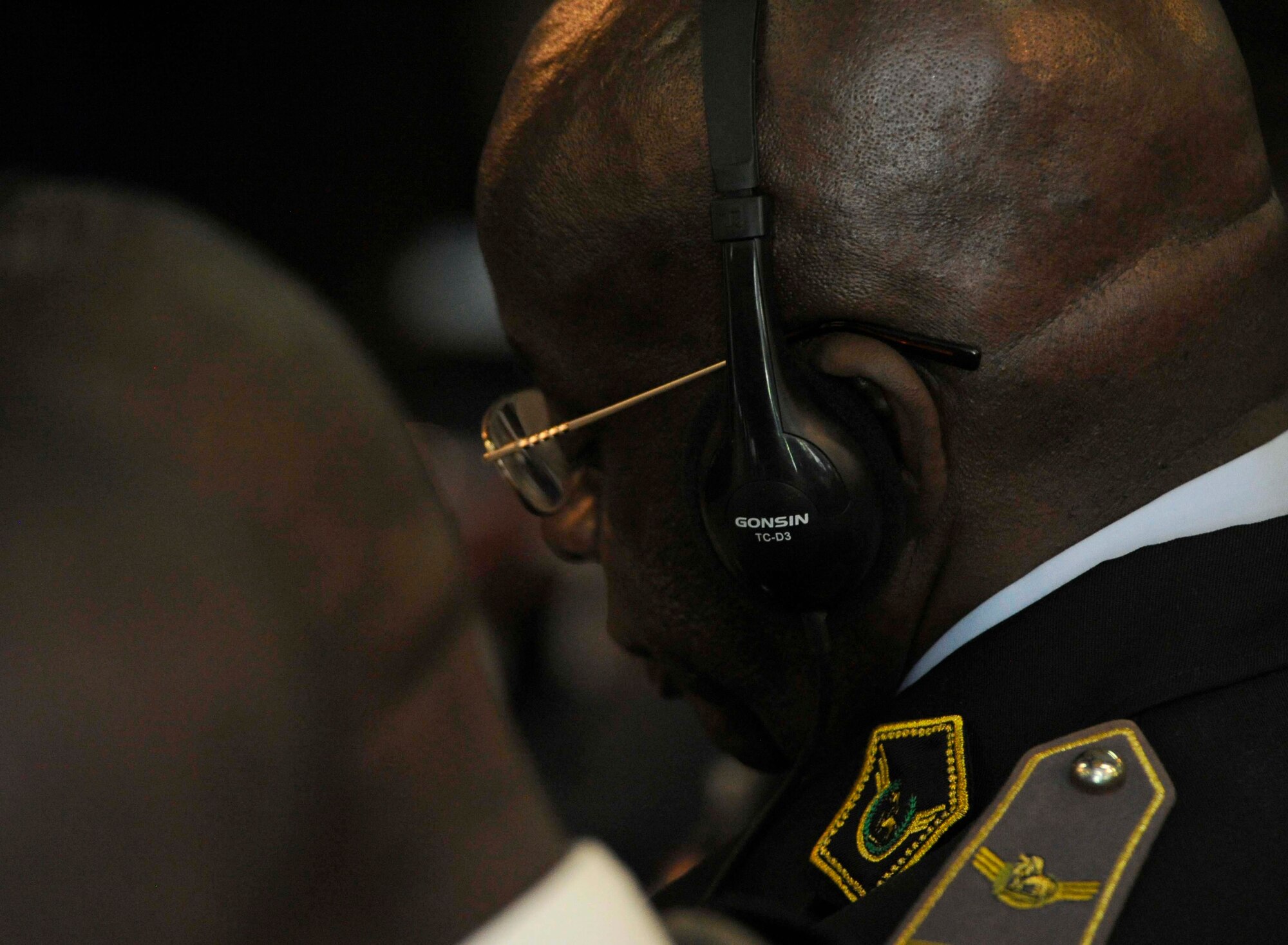 Military leaders of 17 African nations and the United States gather for the 4th annual African Air Chiefs Symposium, Sept. 9, 2014, in Douala, Cameroon. There were many different language speakers at the opening ceremony, participants we able to listen to live interrupters. (U.S. Air Force photo by Tech Sgt. Patrick Mitchell)