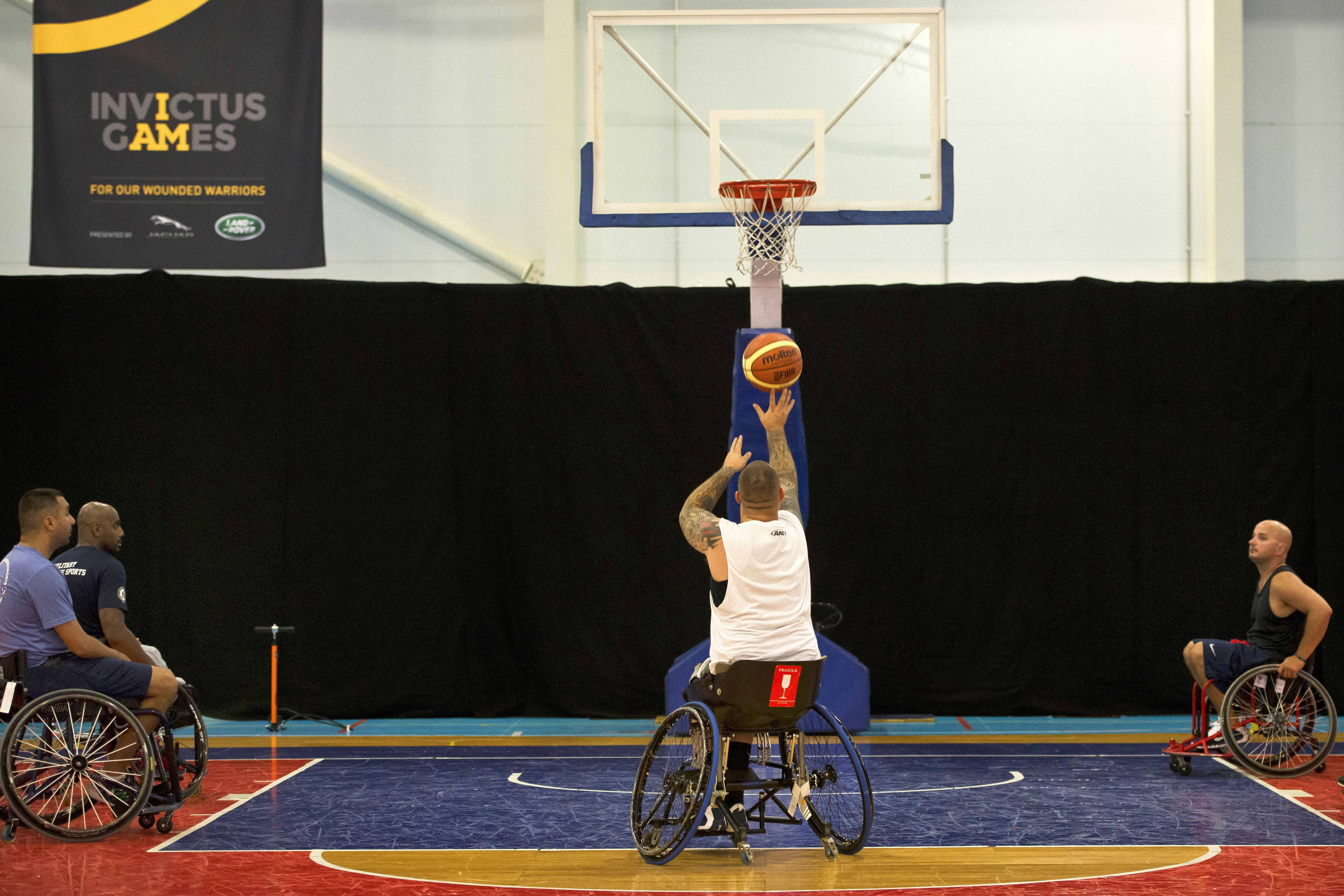 Steven Davis Shoots A Free Throw During A Wheelchair Basketball