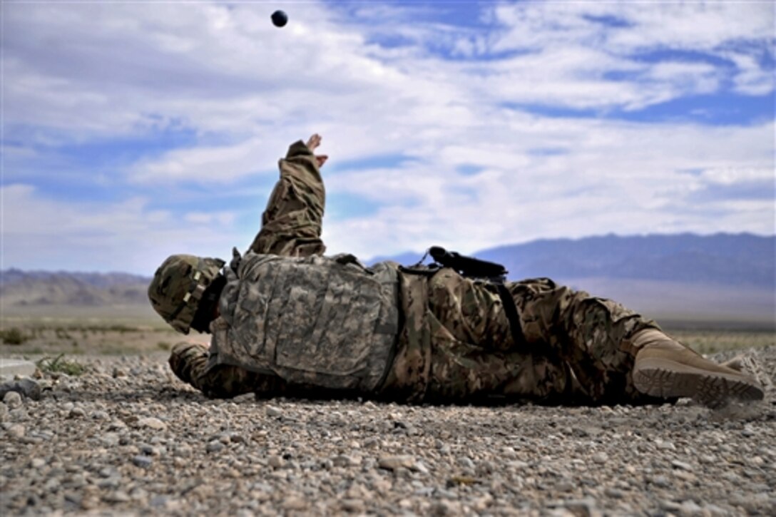 Air Force Staff Sgt. David Garcia throws a practice grenade during a training class on Silver Flag Alpha, Nevada, Aug. 30, 2014. Students completed the course as part of their predeployment training.