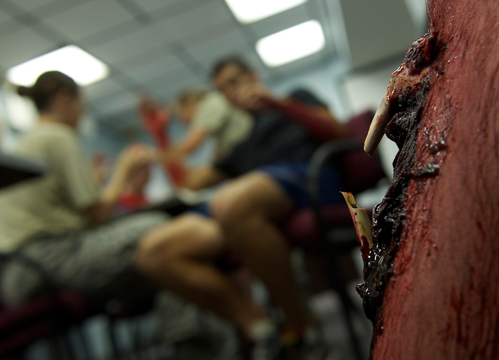 Tactical Air Control Party candidates are moulaged as simulated victims for Exercise Commando Terror at Hurlburt Field, Fla., Sept. 8, 2014. The exercise tested force protection measures and emergency first responder response time.  (U.S. Air Force photo/Senior Airman Christopher Callaway) 