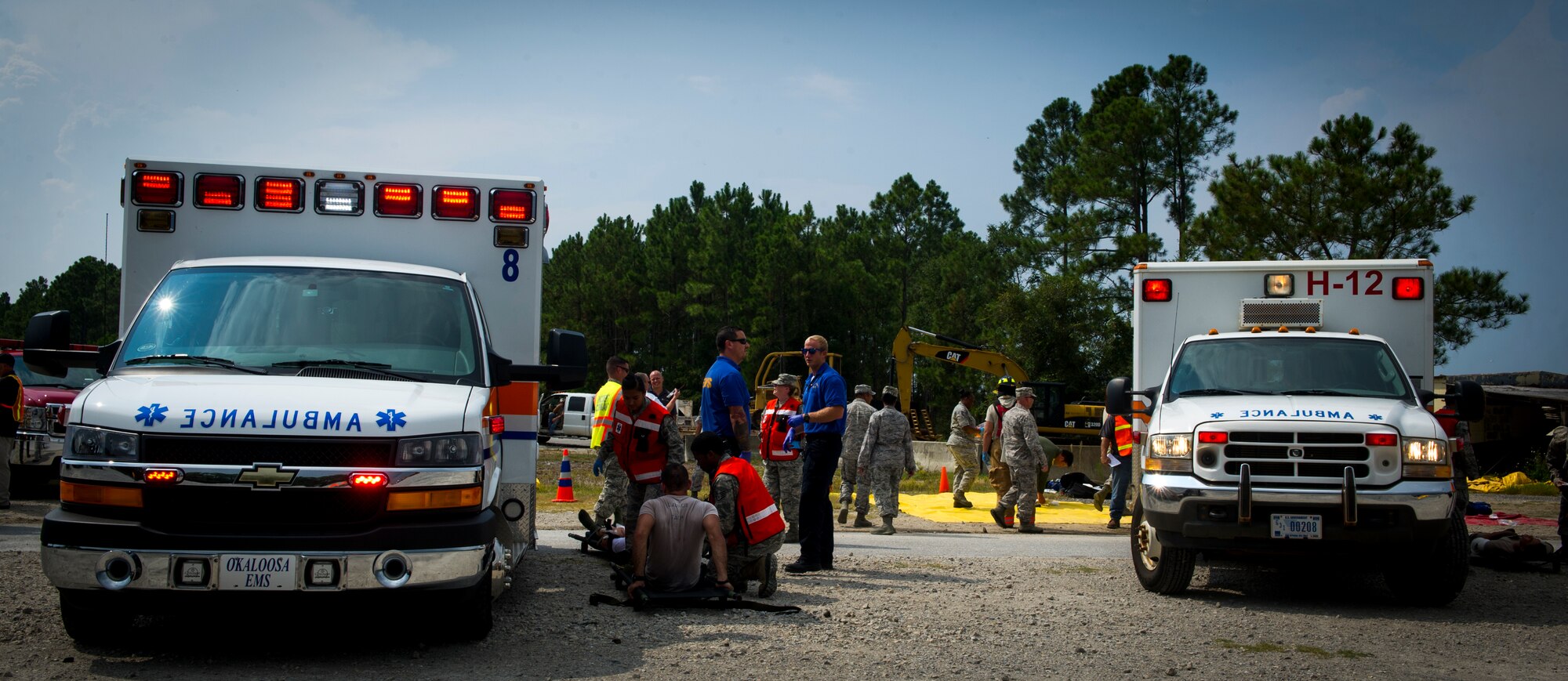 The 1st Special Operations Medical Group and Okaloosa County Emergency Medical Services work together during Exercise Commando Terror at Hurlburt Field, Fla., Sept. 8, 2014. The exercise tested the first responders’ ability to react to a domestic bomb explosion on base. (U.S. Air Force photo/Senior Airman Christopher Callaway)