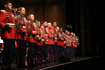 The President's Own Marine Band brass section takes center stage during the band's performance at Butler University in Indianapolis Sep. 7. The Band performed for more than 1,500 people at Clowes Memorial Hall during their 30-day fall concert tour across the United States.